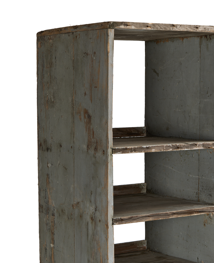 Vintage French oak shelves, distressed grey paint showing natural wood grain and wear.