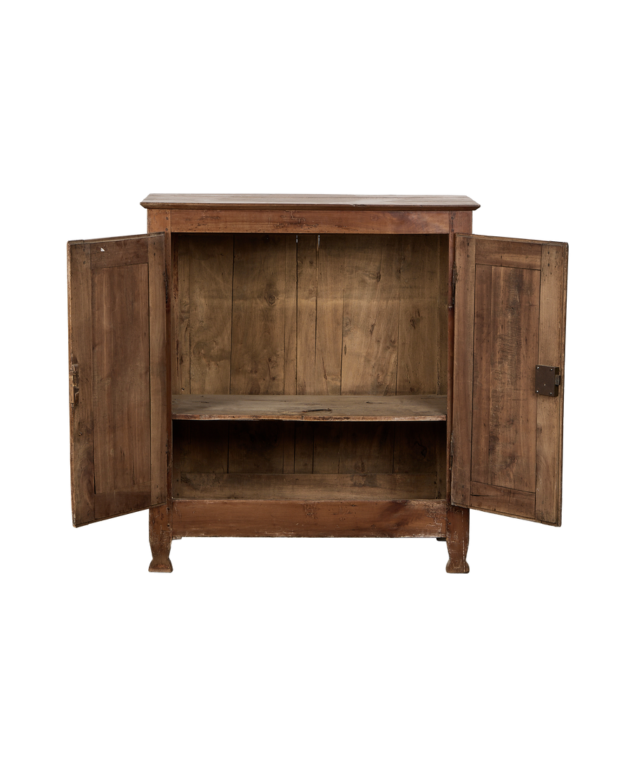 Vintage Parisian oak cabinet with open doors reveal interior shelf and aged wood grain.