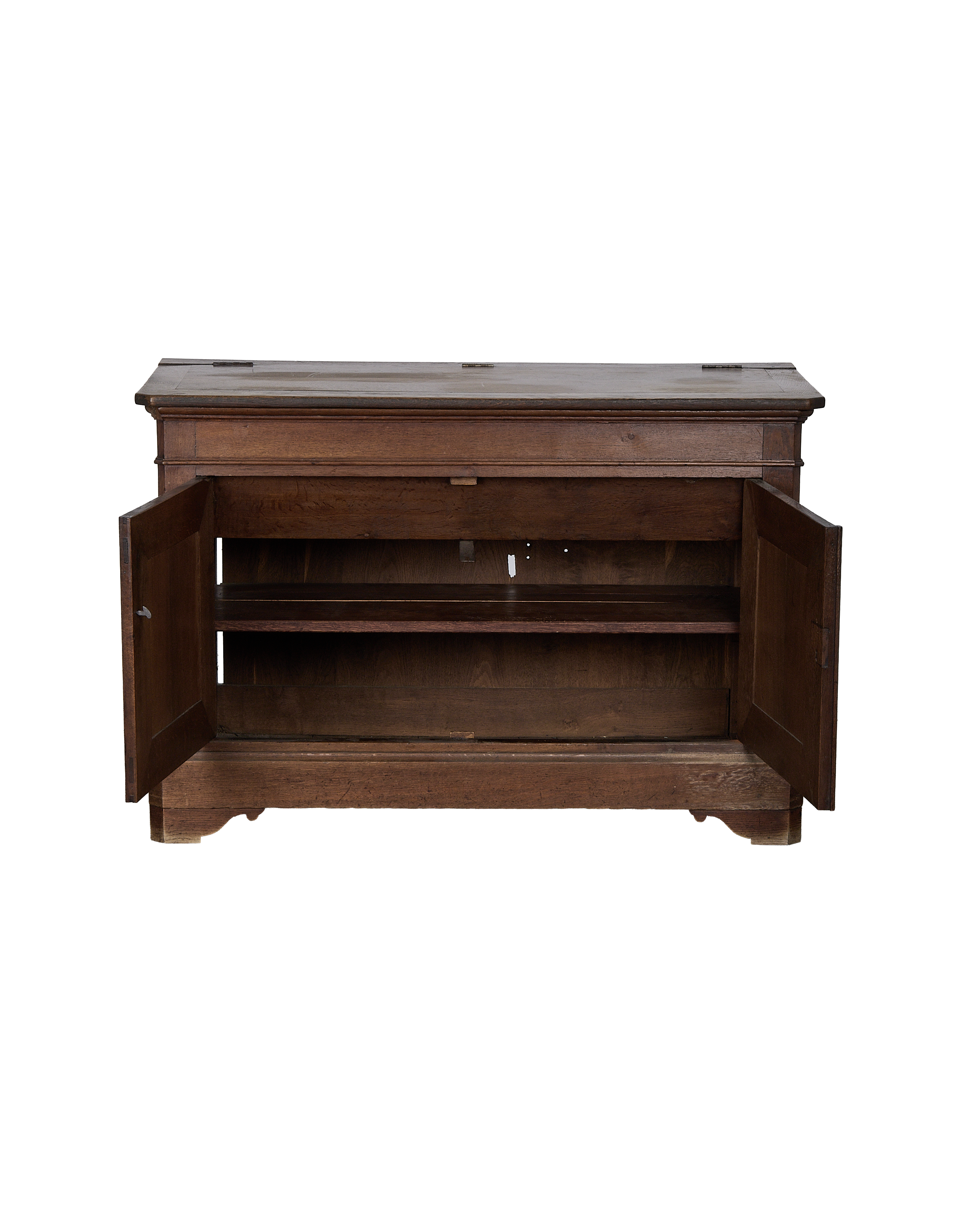 Vintage French oak sideboard, cabinet doors open showing internal brown shelving and original hardware.