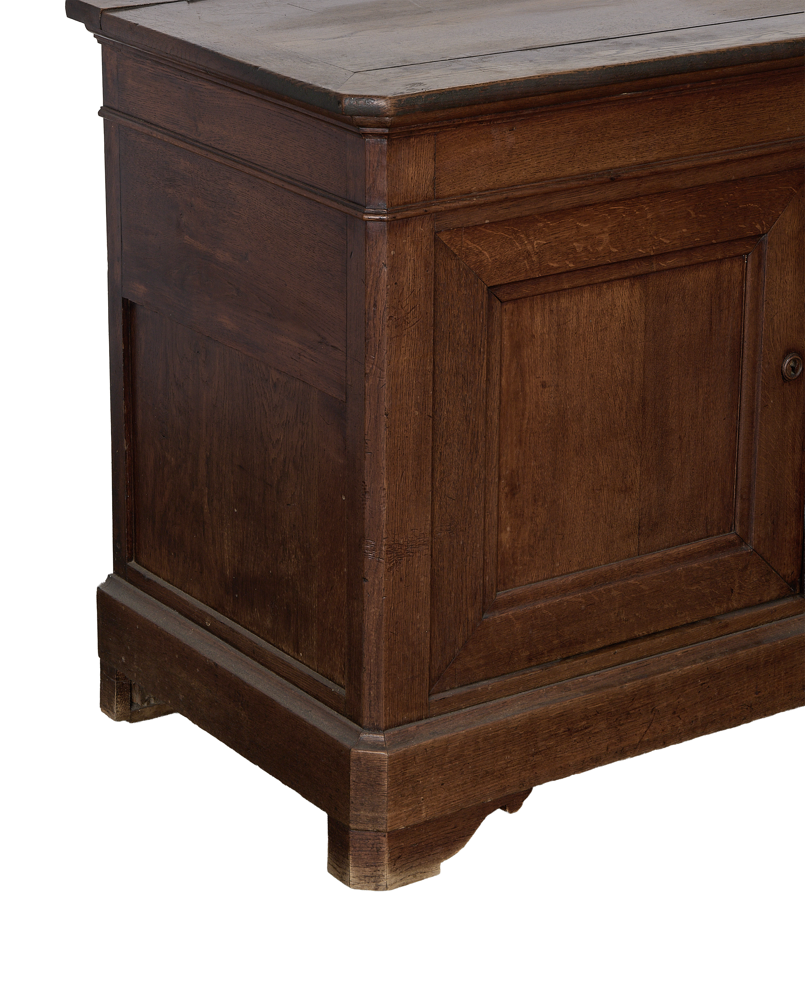 Vintage French oak sideboard: Close-up on right side panel and base detail.