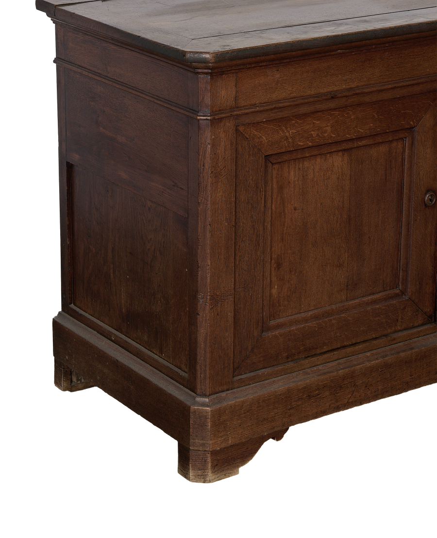 Vintage French oak sideboard: Close-up on right side panel and base detail.