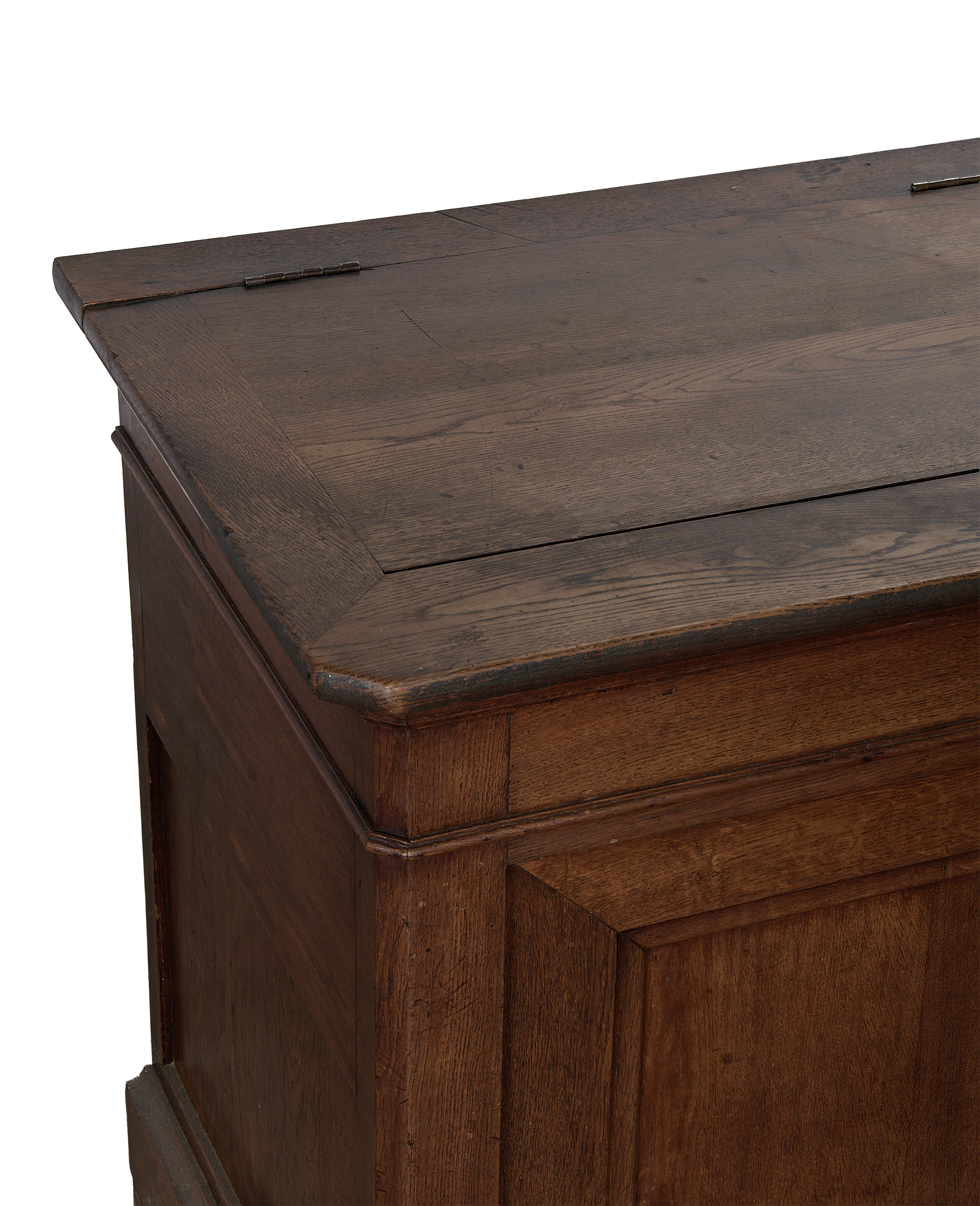 Vintage French oak sideboard: detailed close-up of hinged lid with visible wood grain and wear.