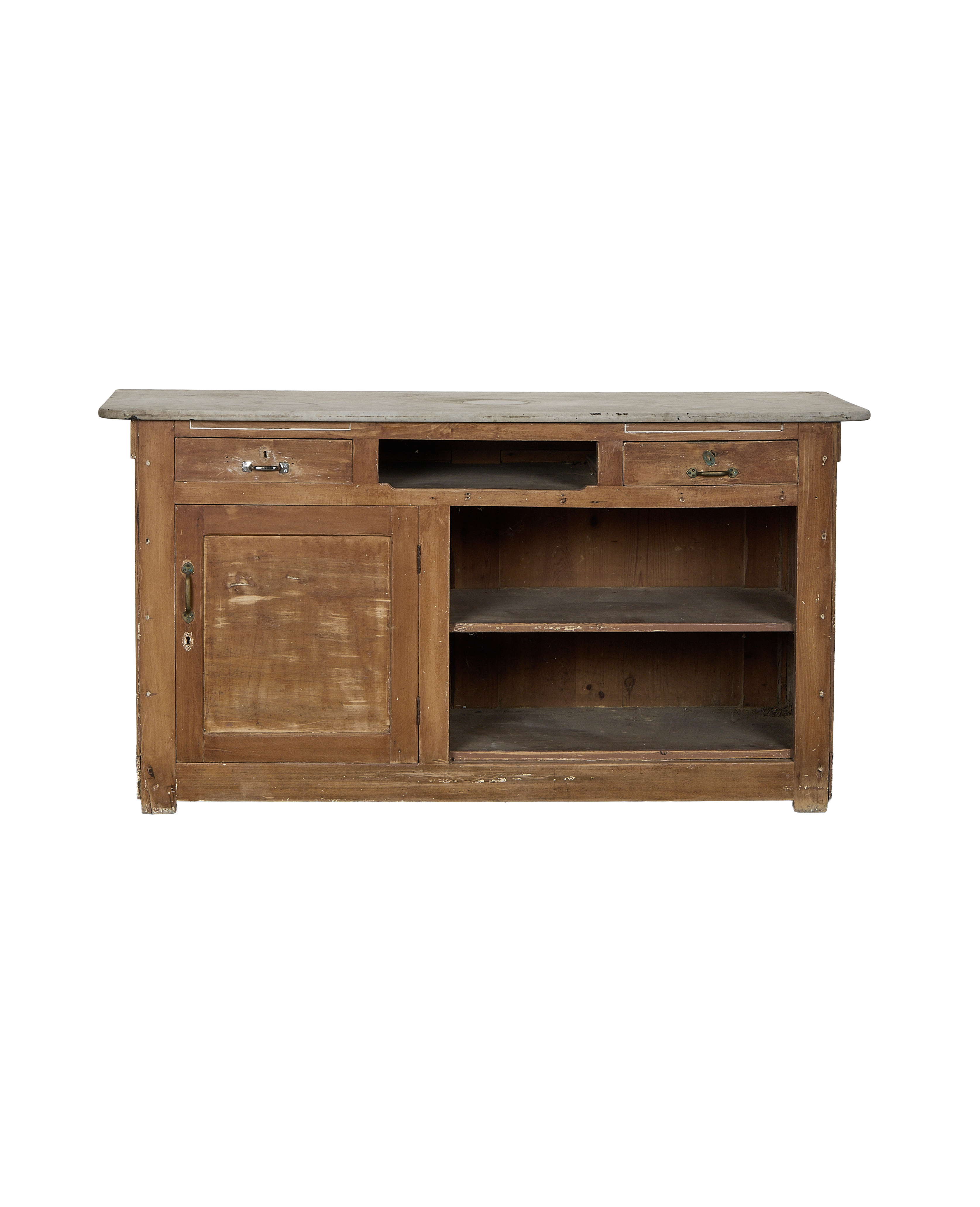 Vintage French oak bakery counter with marble top, drawers, and open shelving.