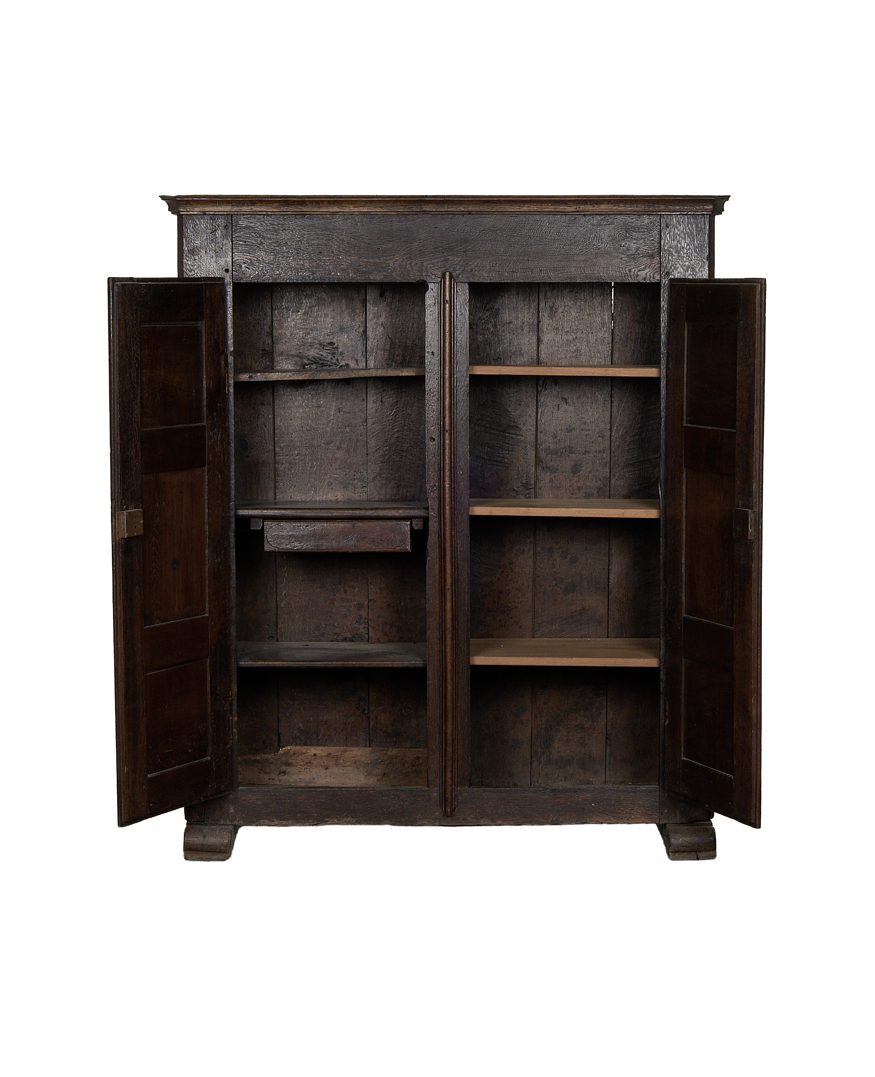 Open vintage 1850s French oak cabinet, showing interior shelves and worn wood texture.