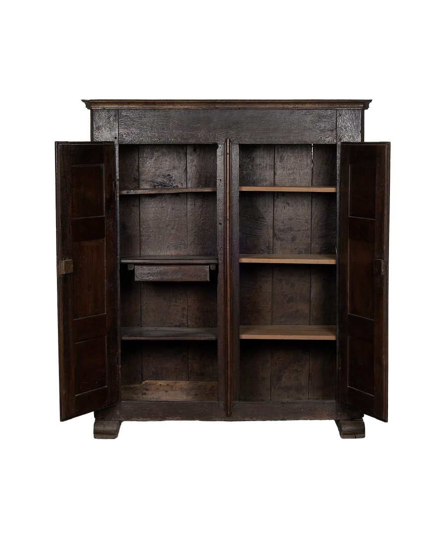 Open vintage 1850s French oak cabinet, showing interior shelves and worn wood texture.