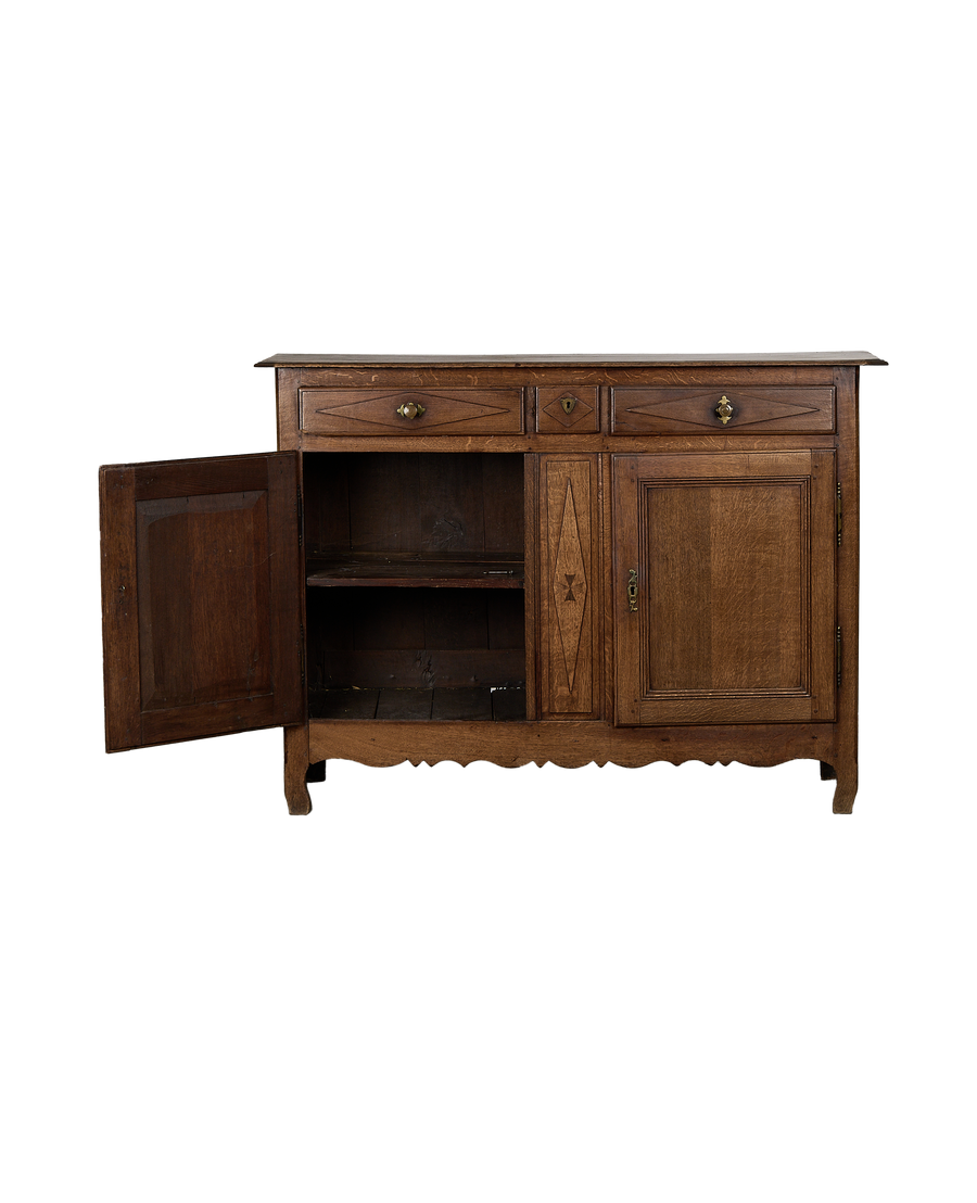 Vintage French oak dresser with open left cabinet unveiling two shelves.