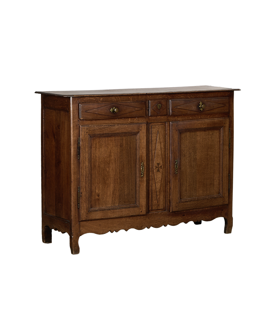 French vintage oak dresser, detailed view of wood grain and brass hardware.