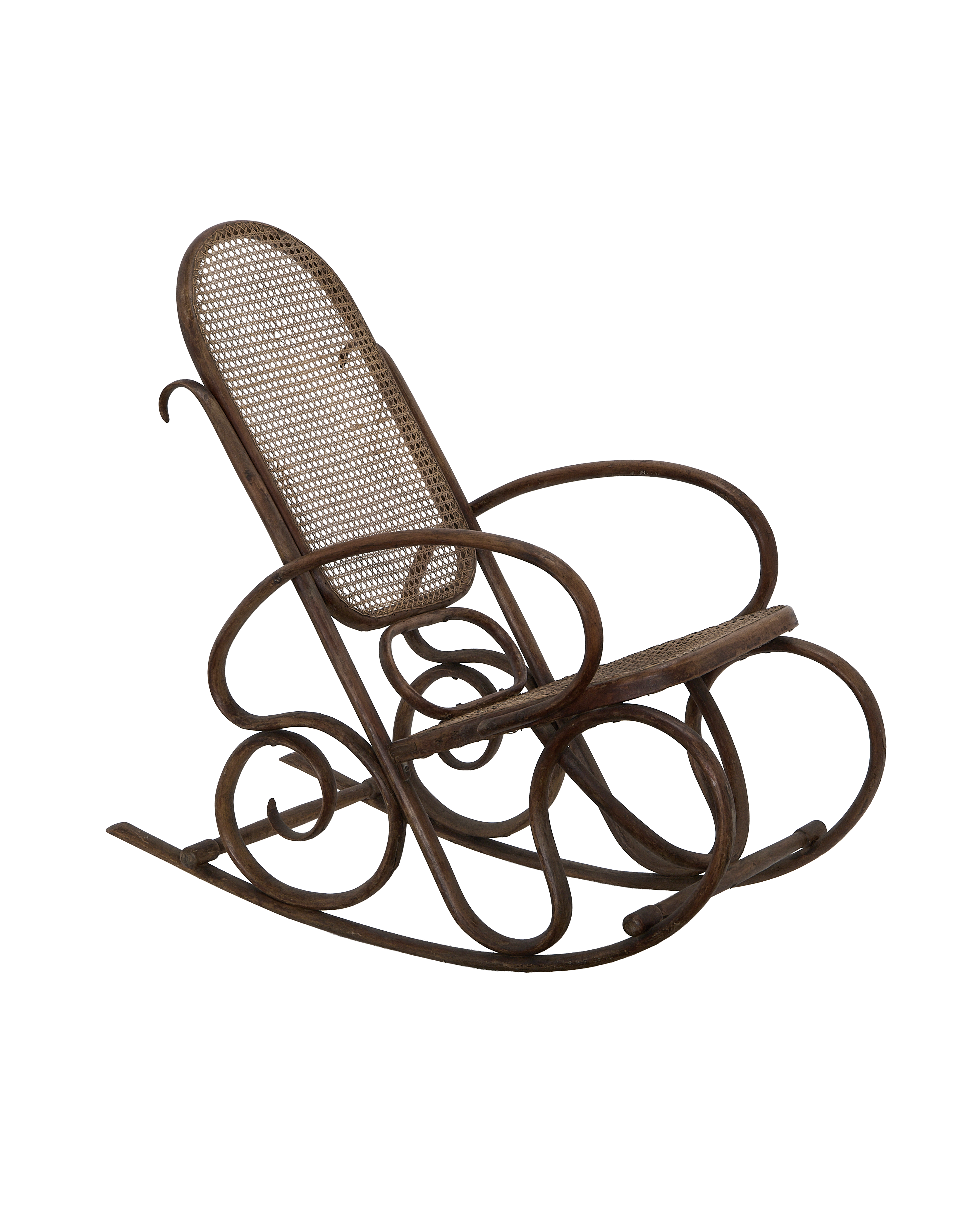 Vintage Thonet oak rocking chair from France, showing ornate bentwood frame detail.