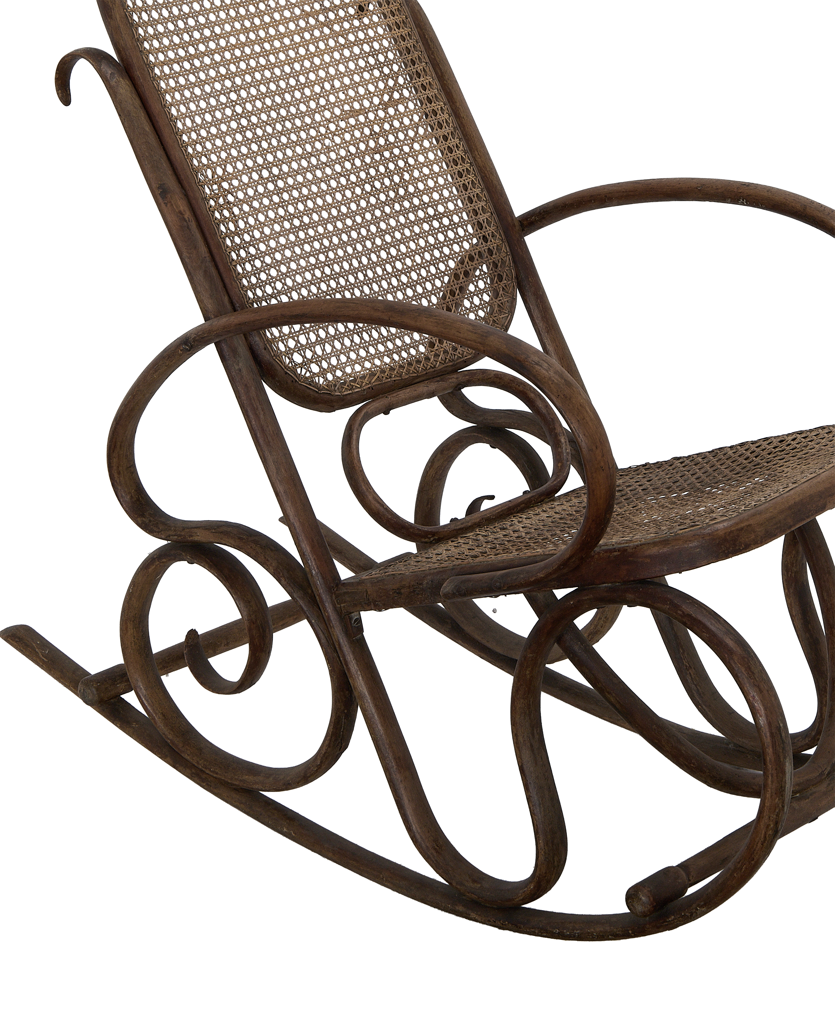 Vintage Thonet oak rocking chair, right side view showing bentwood curves and elegant cane weaving.
