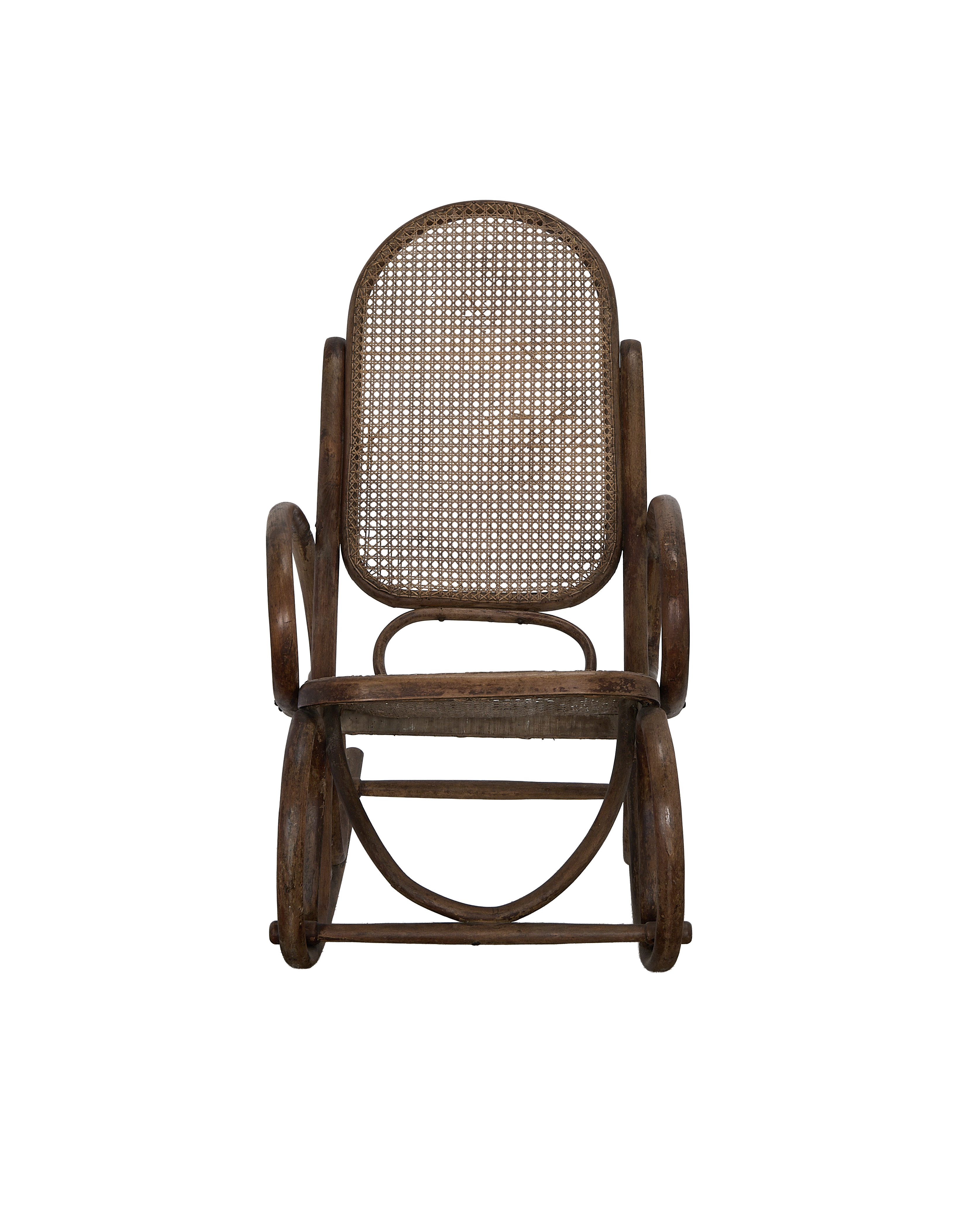 Vintage French Thonet oak rocking chair, showing cane back detail and bowed rockers.