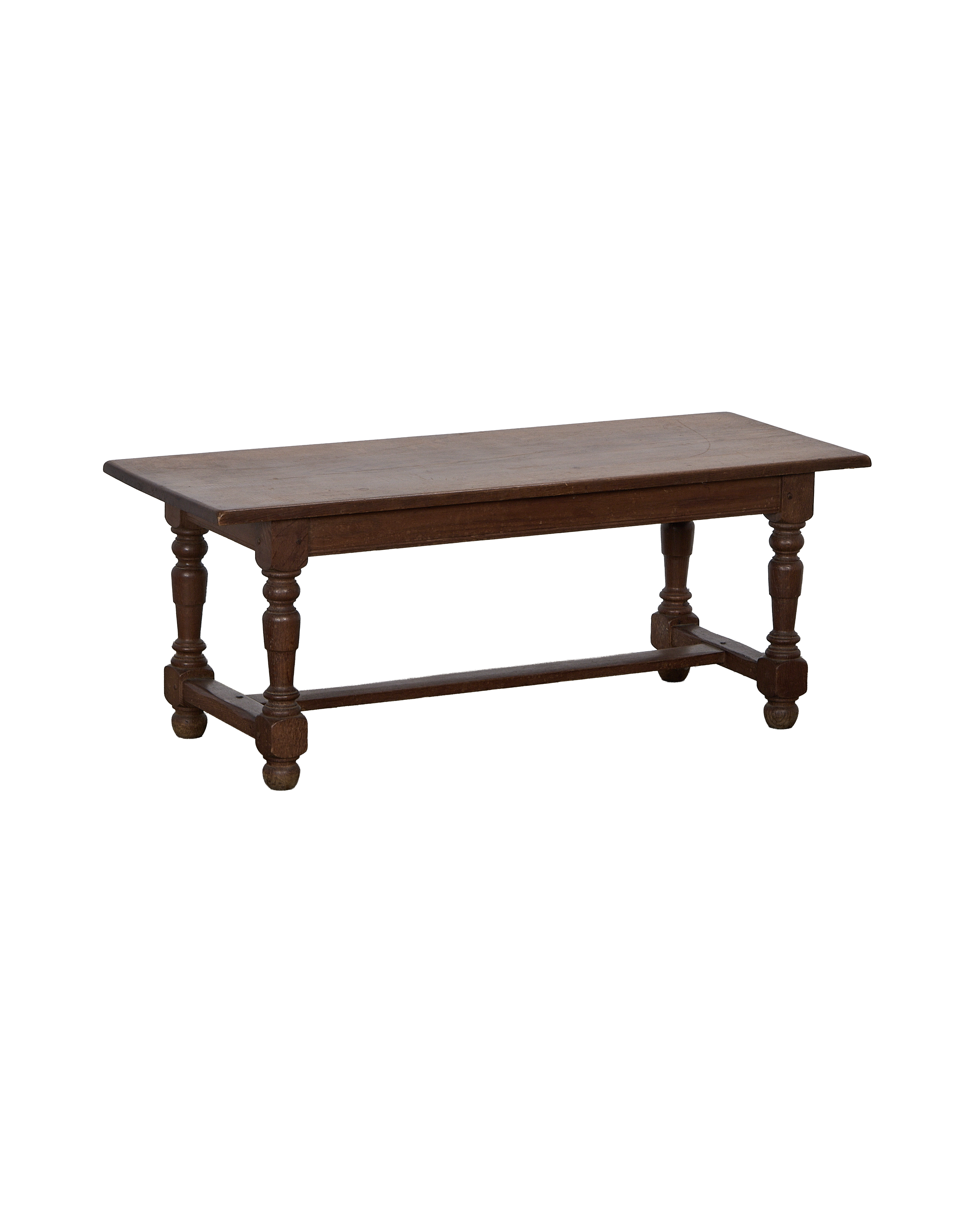 Vintage French oak coffee table with turned legs and connecting stretcher, full view.