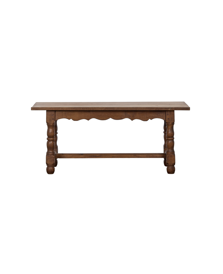 Vintage French oak coffee table, front view displaying carved legs and scalloped skirt.