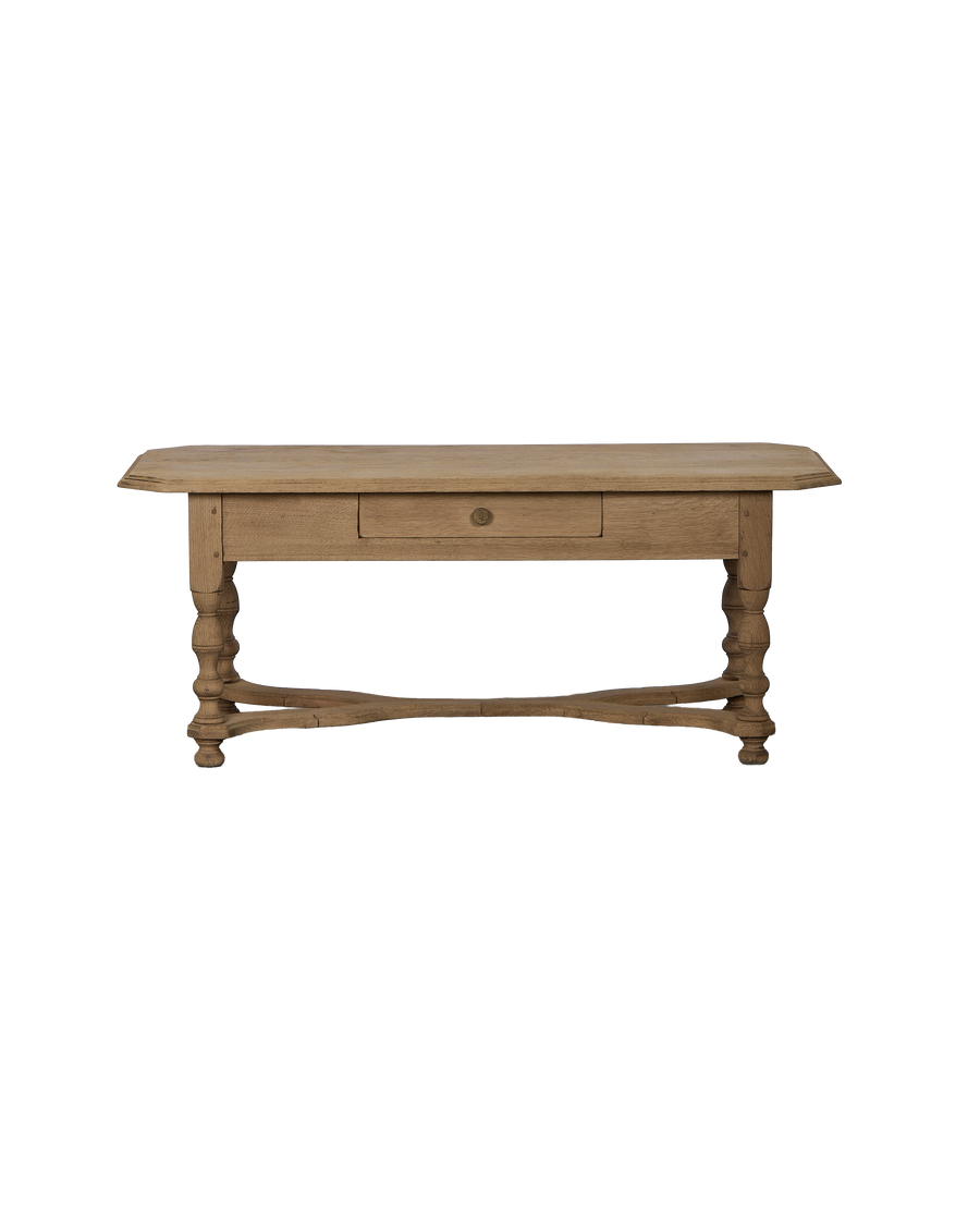 Vintage French pine coffee table, front view showing single drawer with brass knob.