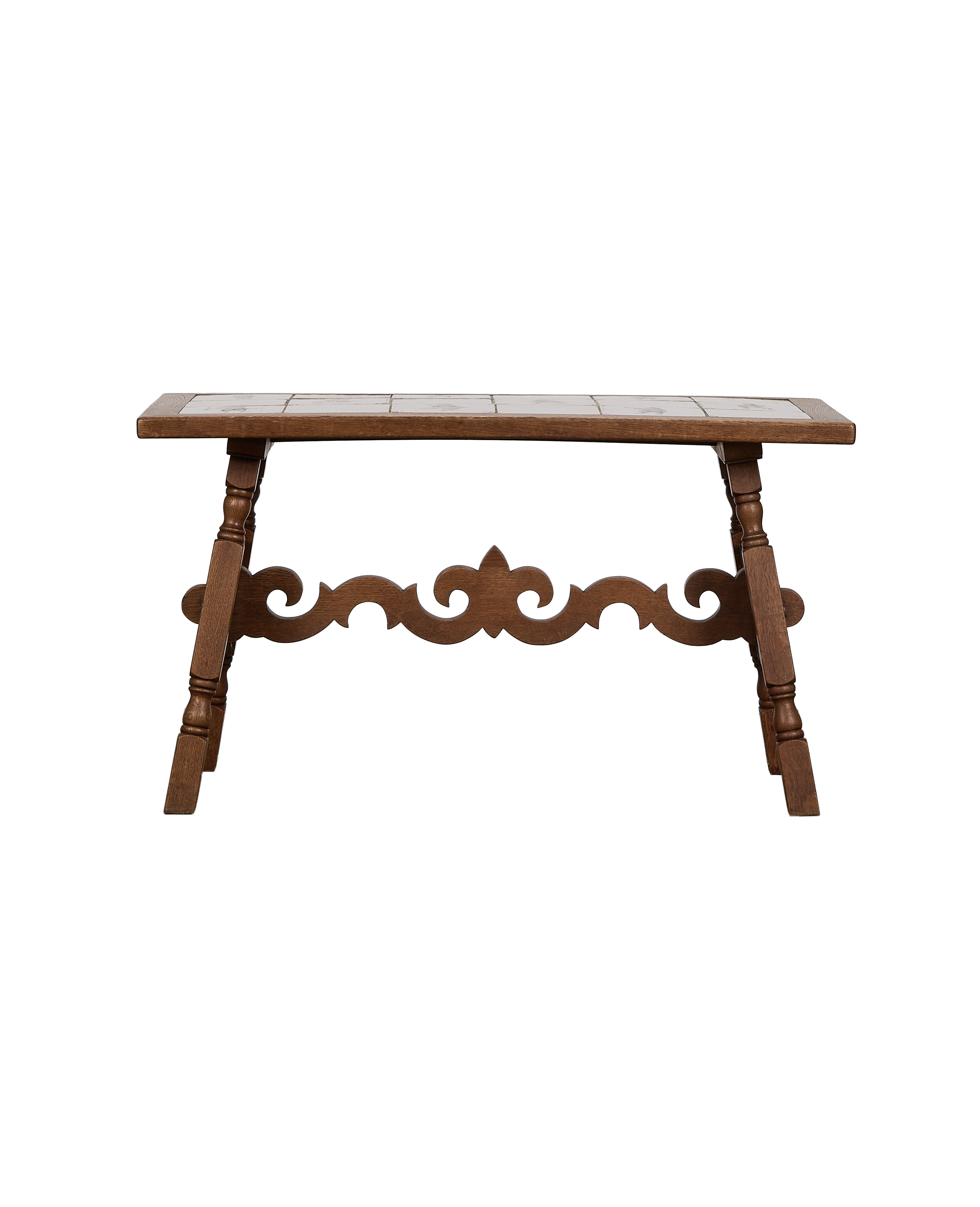 Vintage French oak Delft tile coffee table, detailed view of ornate carved base.