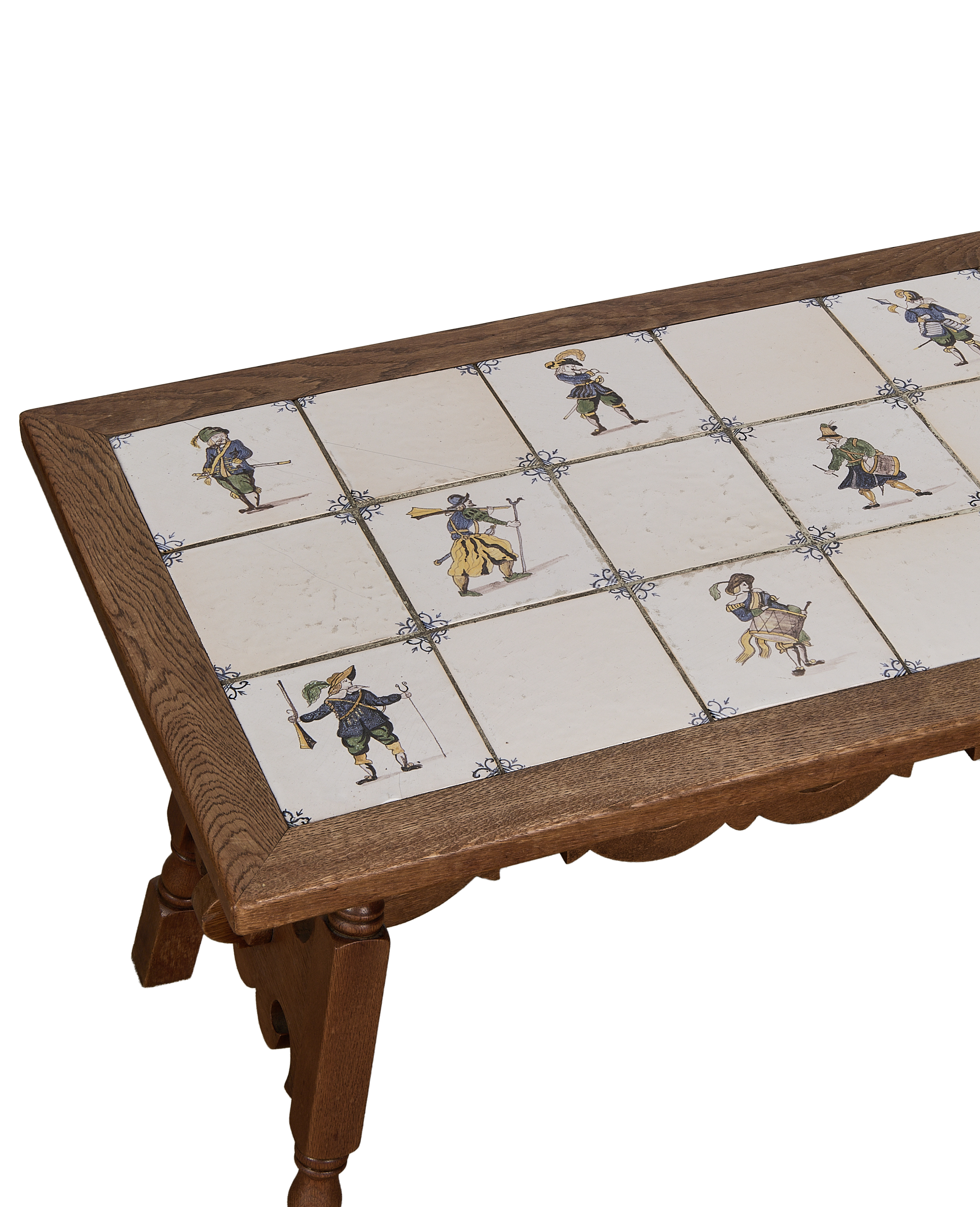 Close-up, vintage French oak Delft tile coffee table top with detailed individual warrior design.