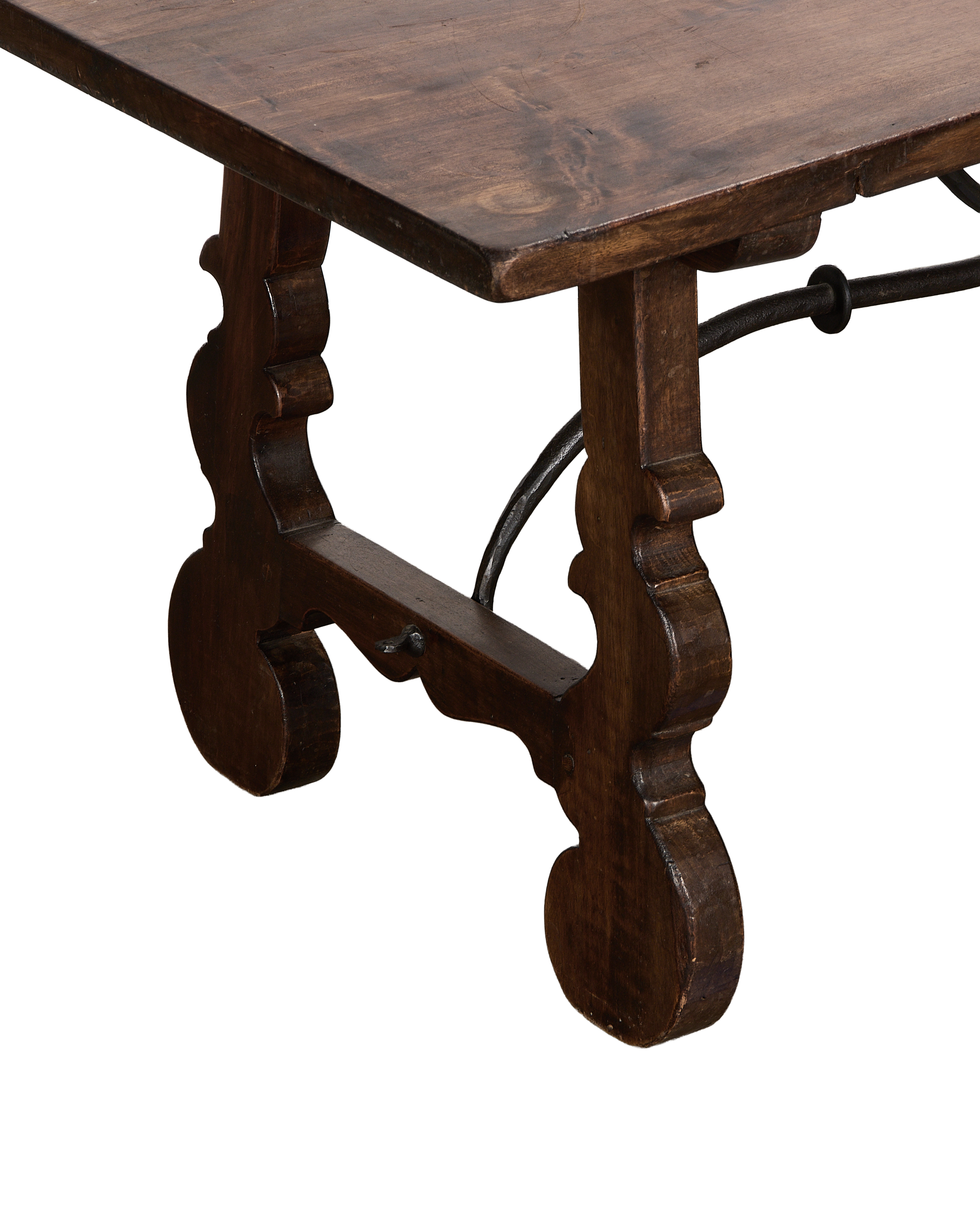 Vintage French oak refectory coffee table showing curved scroll legs and iron tie-bar.