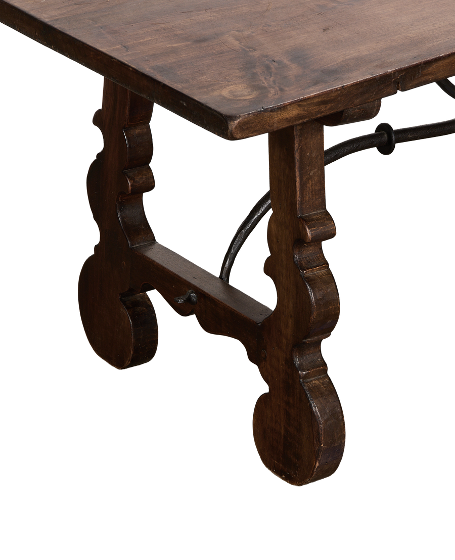 Vintage French oak refectory coffee table showing curved scroll legs and iron tie-bar.