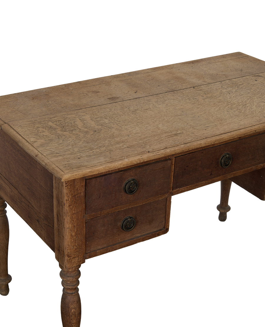 Vintage oak desk top and drawers from France, showing distressed wood texture.