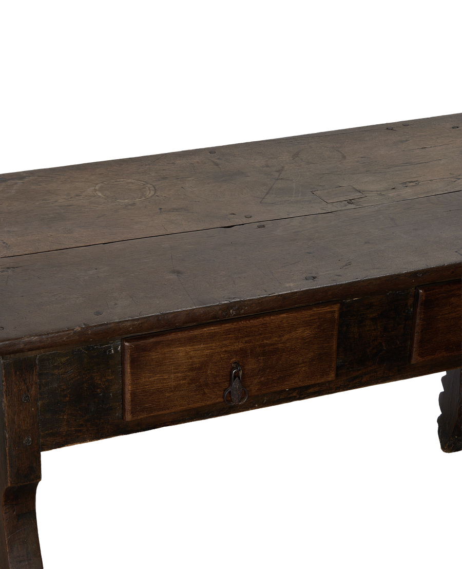 Vintage French oak drawer table, close-up top view, showing weathered wood and rustic drawer pull.