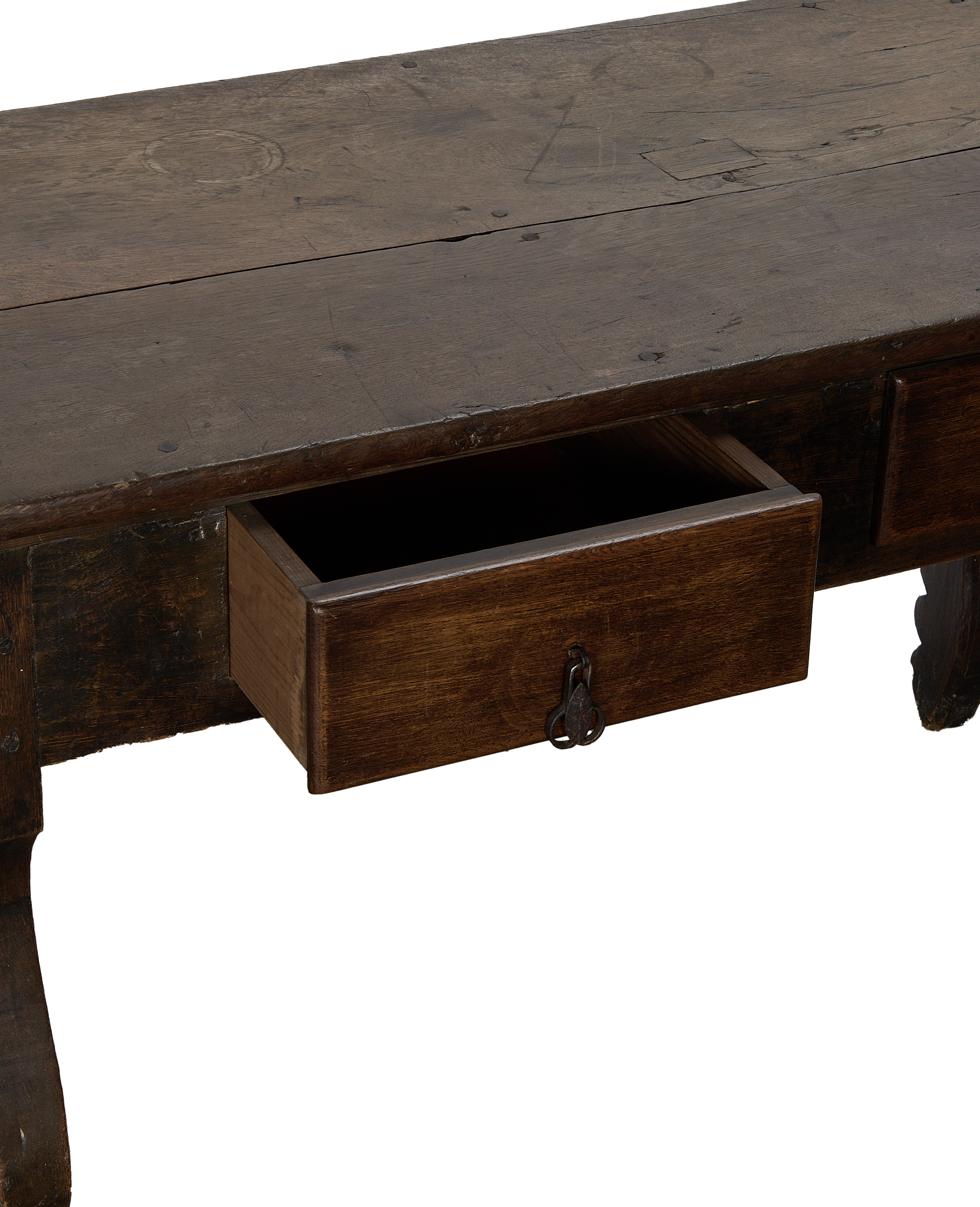 Open drawer and keyhole pull on antique French oak vintage table.