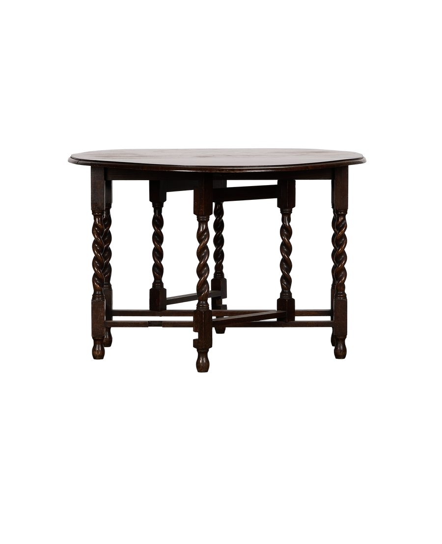 Vintage French oak gate leg table with turned bobbin legs and folded top.