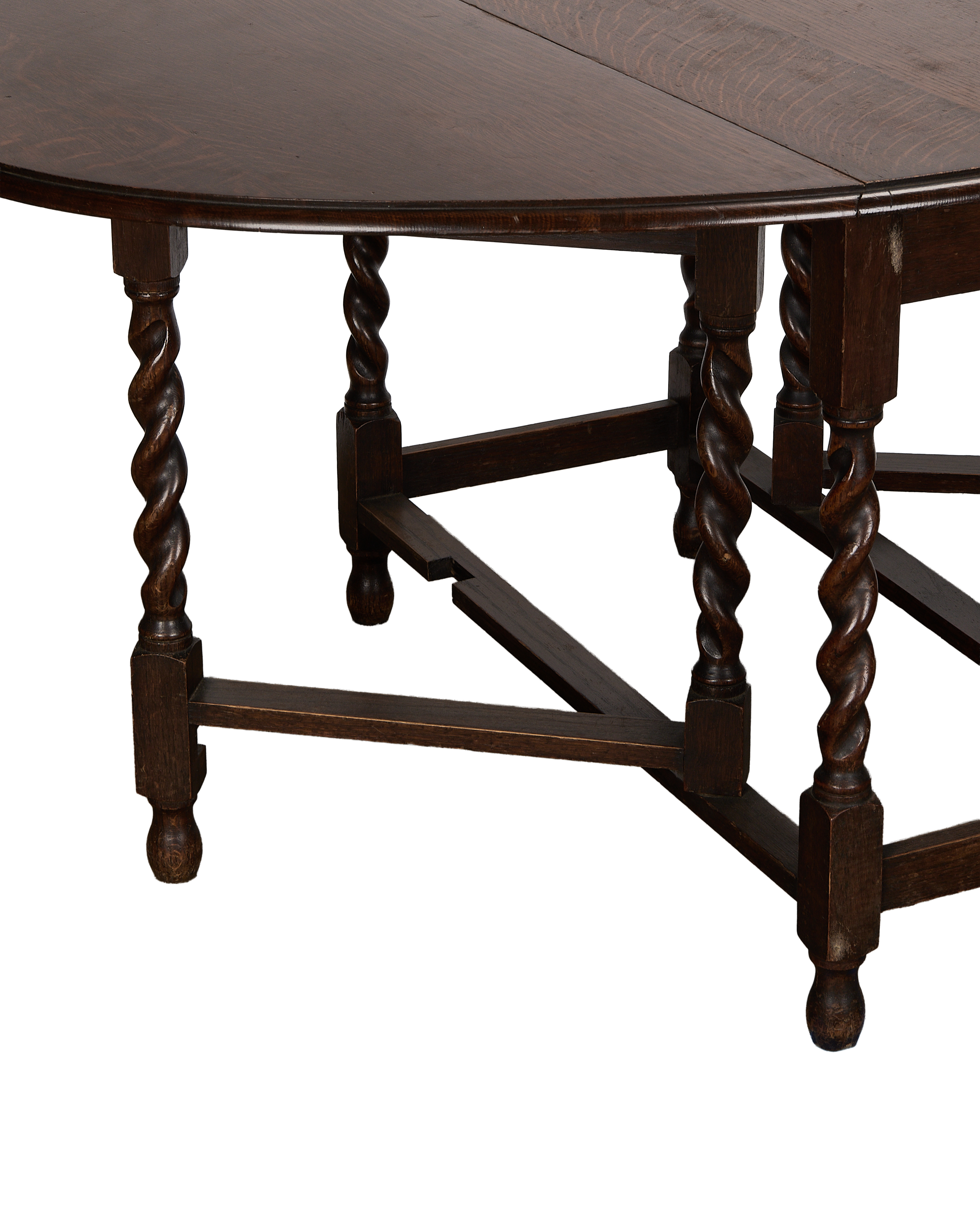 Vintage French oak gate leg table, showing ornate barley twist legs and side stretcher detail.