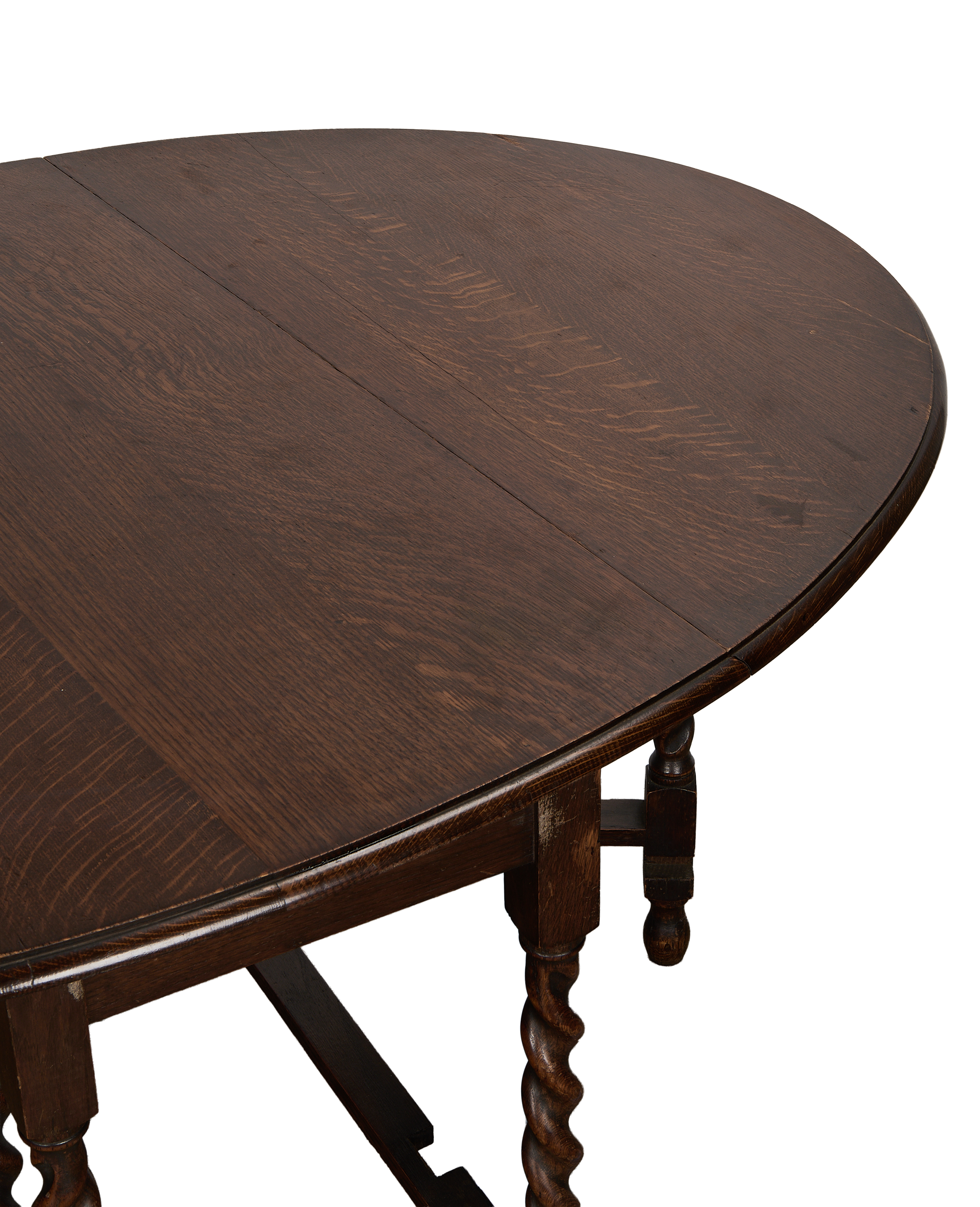 Vintage French oak gate leg table, showing ornate barley twist legs and tabletop wood grain.