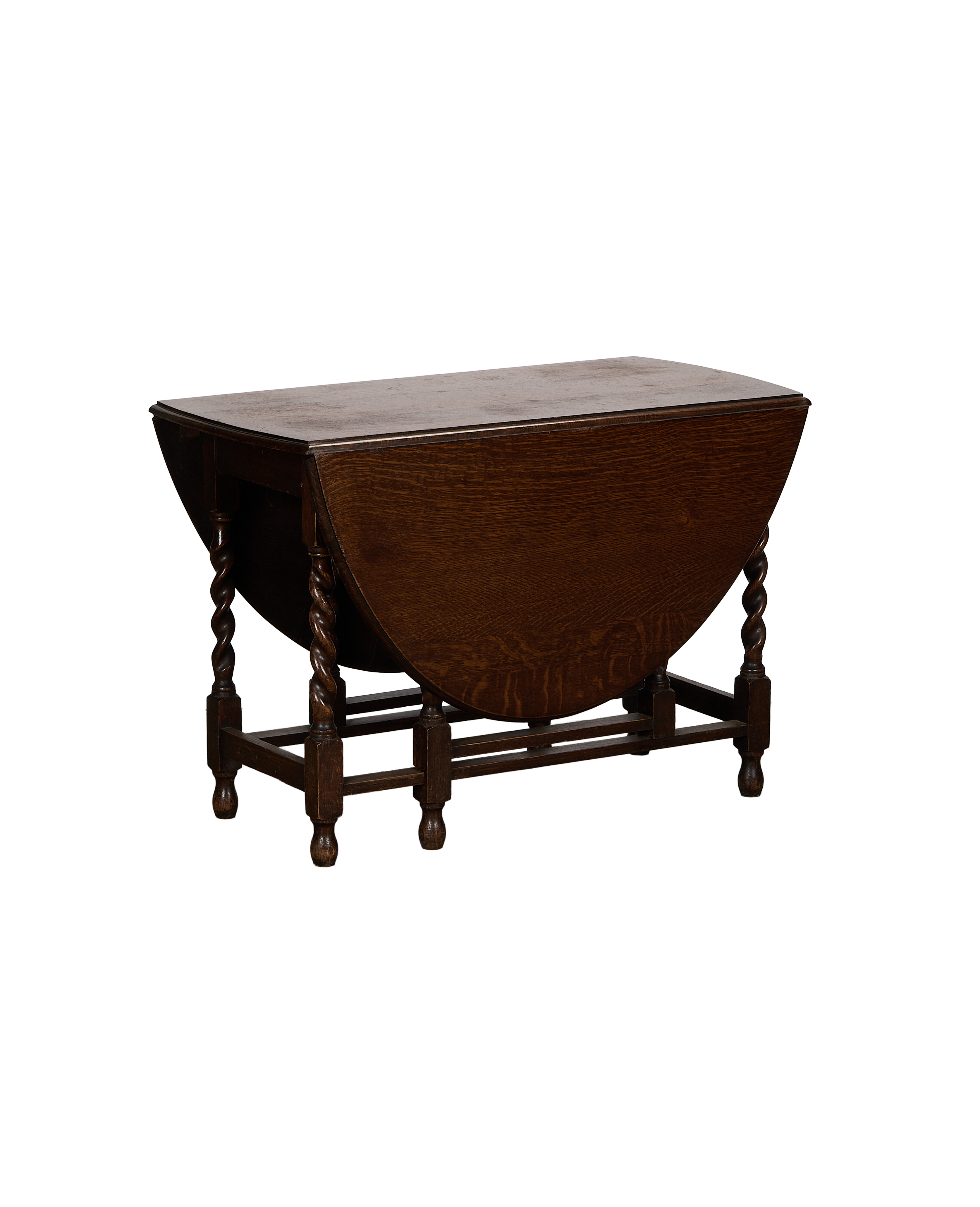 Vintage French oak gate leg table, closed, with barley twist legs, dark wood.