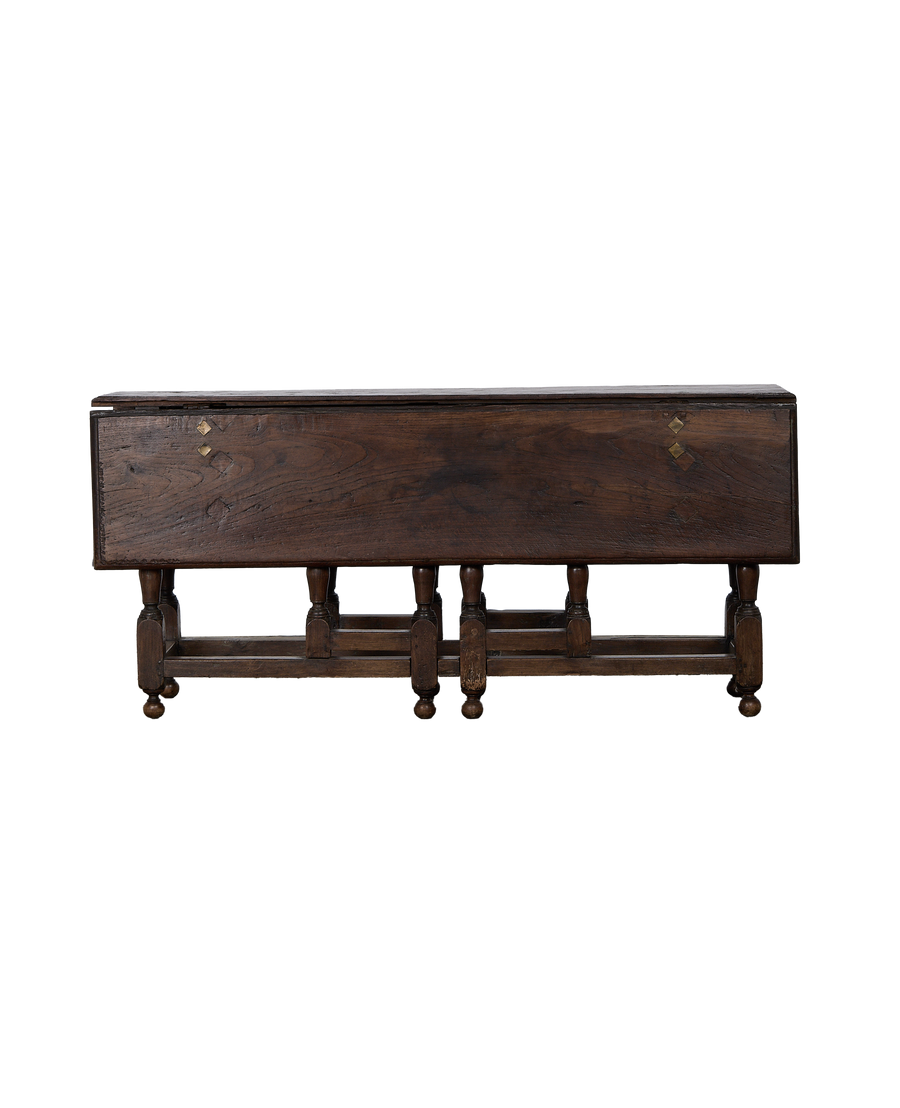 Vintage French oak folding table, rich dark wood, brass diamond accents, folded view.