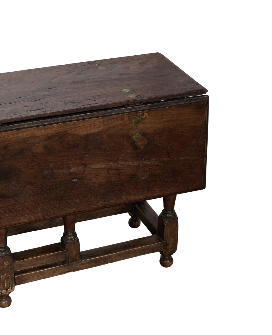 Vintage Spanish folding oak table, brass diamond inlay detail, turned legs, warm patina.