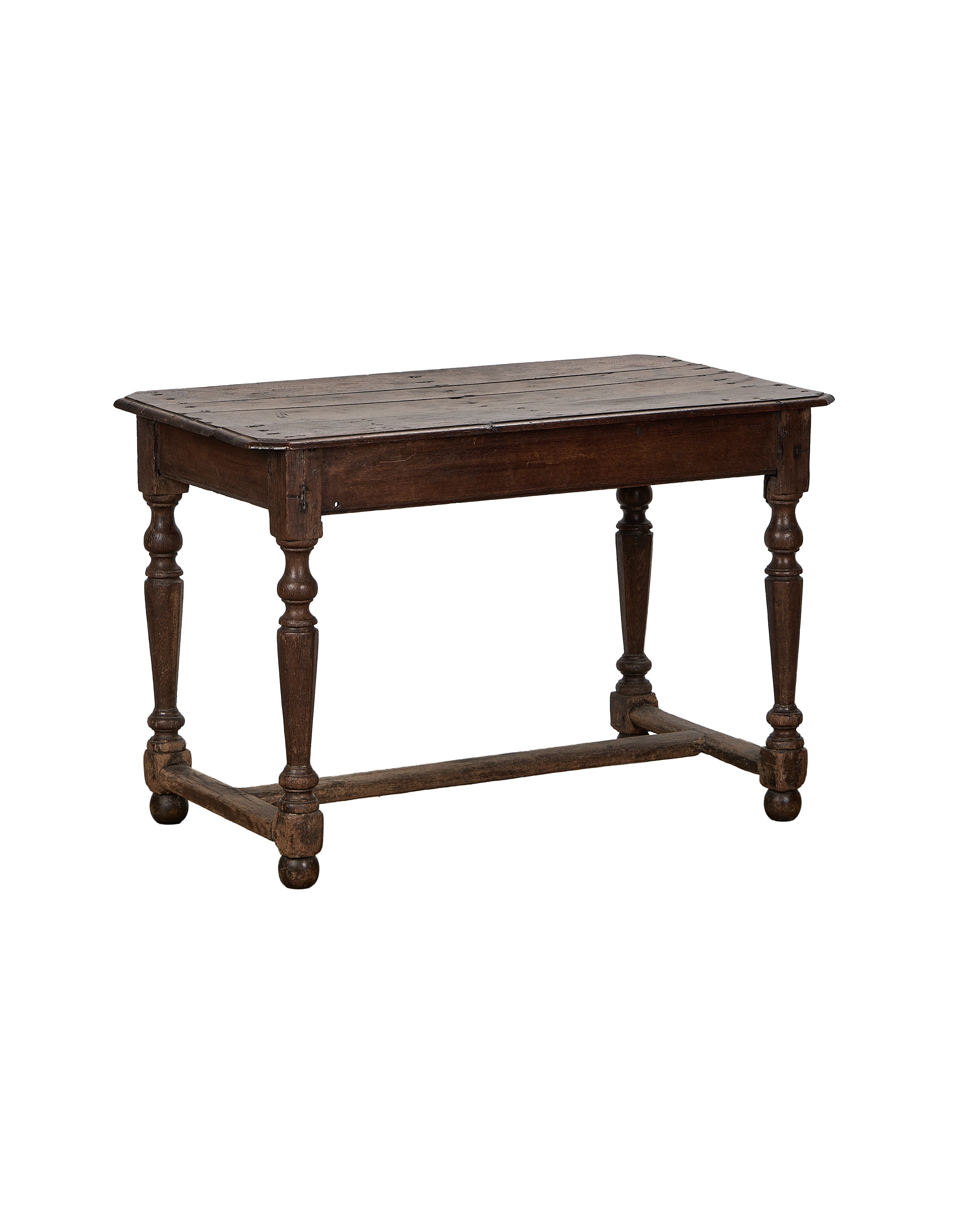Vintage French oak console table, showing turned legs and stretcher, with rustic aged wood.