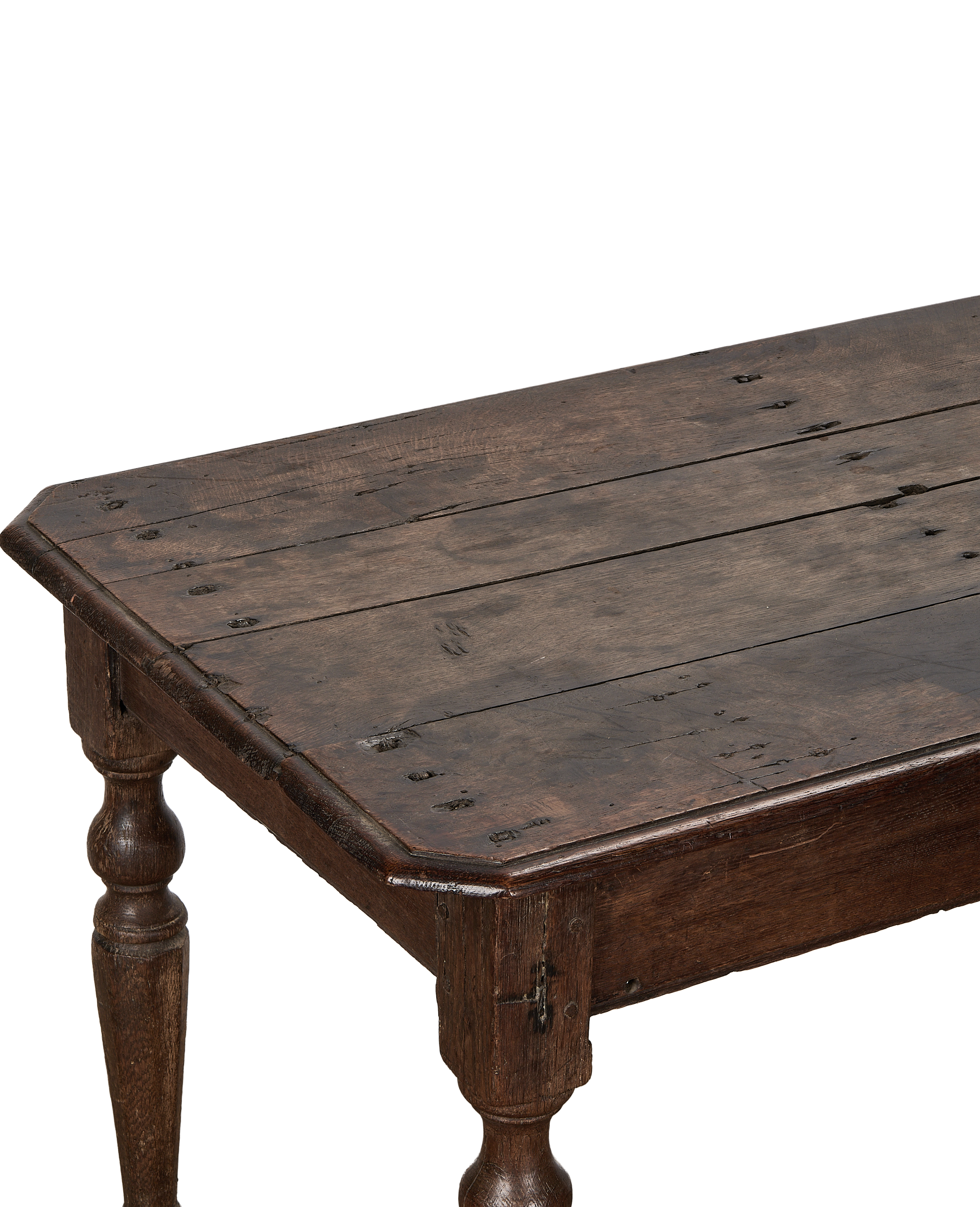 Vintage French oak console table, close-up of distressed tabletop and turned leg detail.