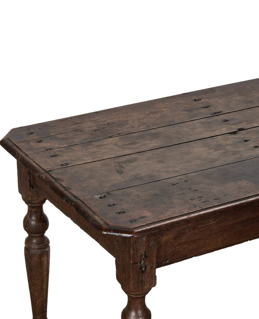 Vintage French oak console table, close-up of distressed tabletop and turned leg detail.