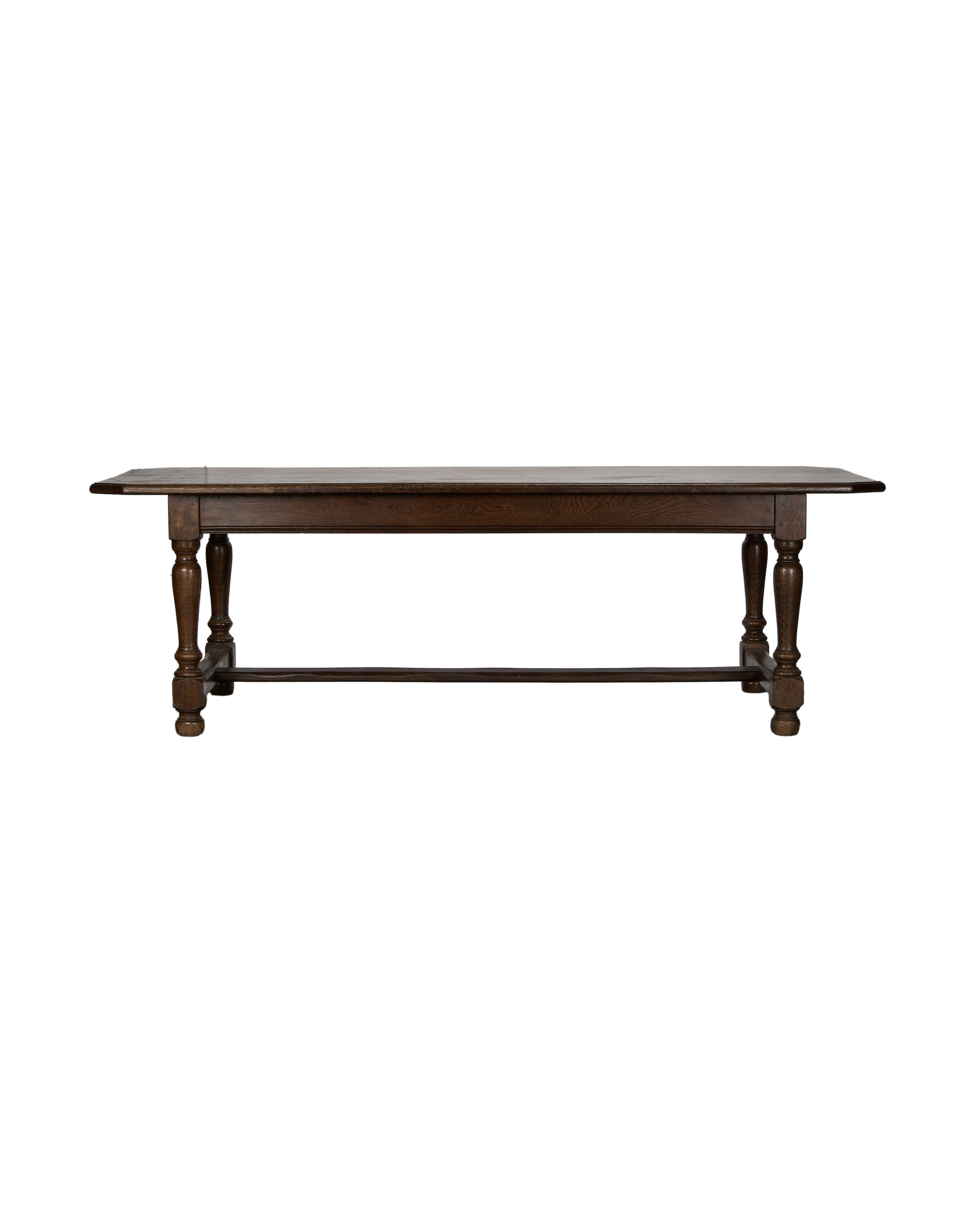 Vintage French oak Drapers Dining Table, dark wood, with elegant turned legs.