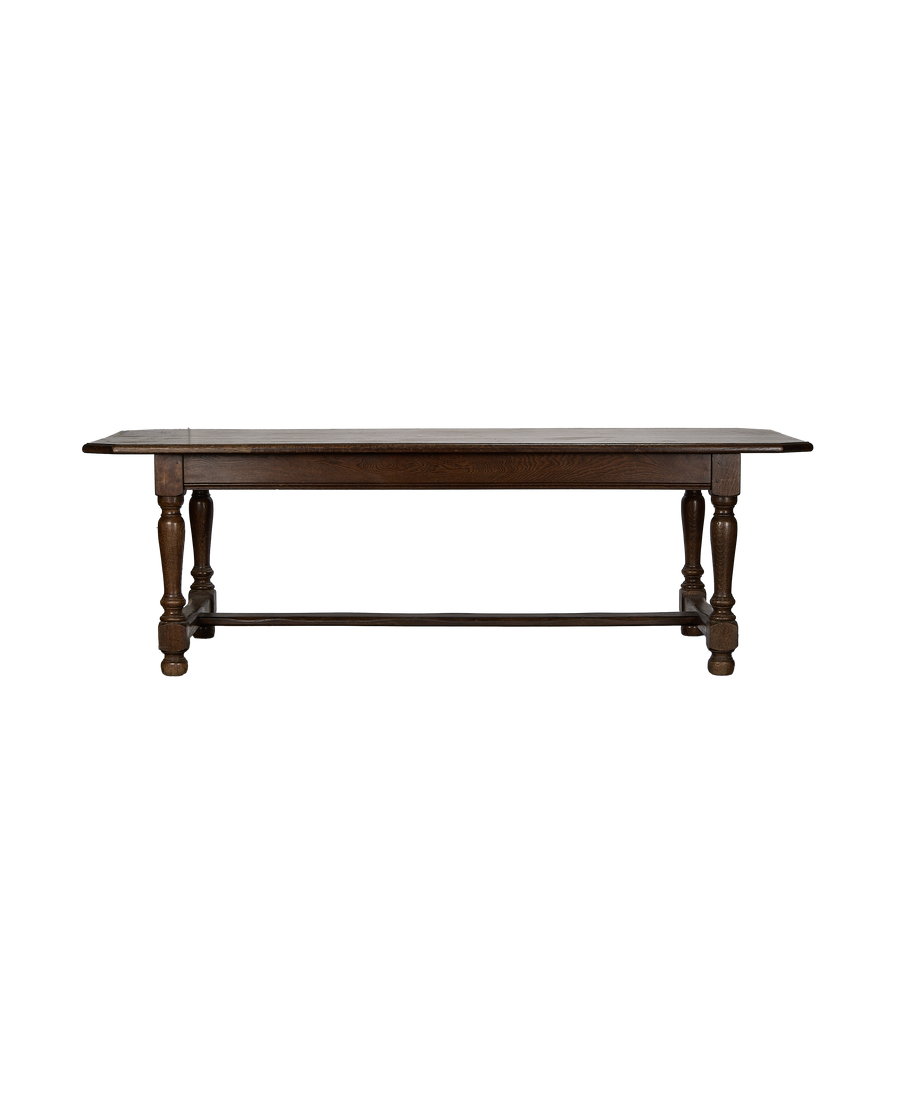 Vintage French oak Drapers Dining Table, dark wood, with elegant turned legs.