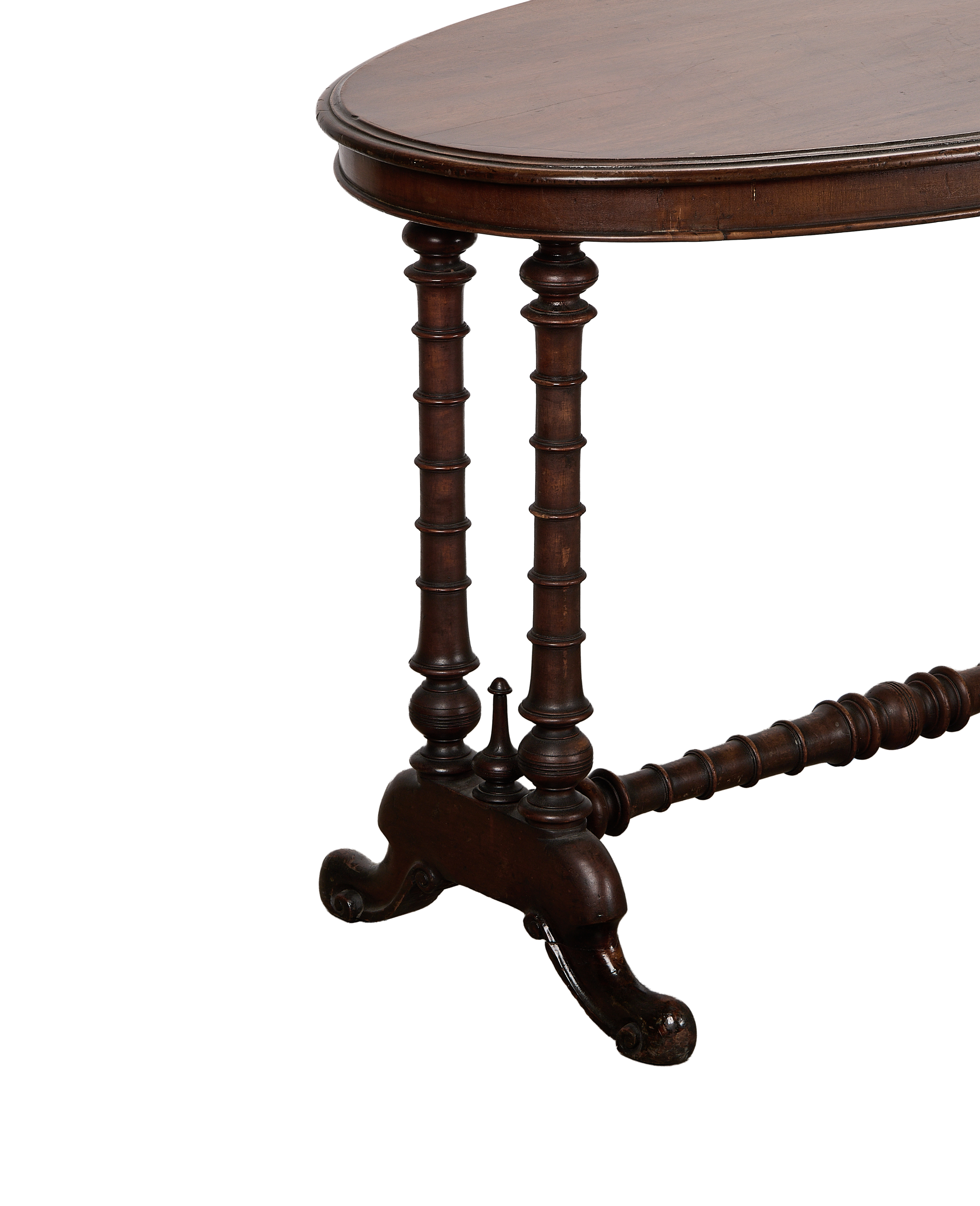 Vintage French oval oak entry table, showing carved turned legs, stretcher, and scrolled feet.