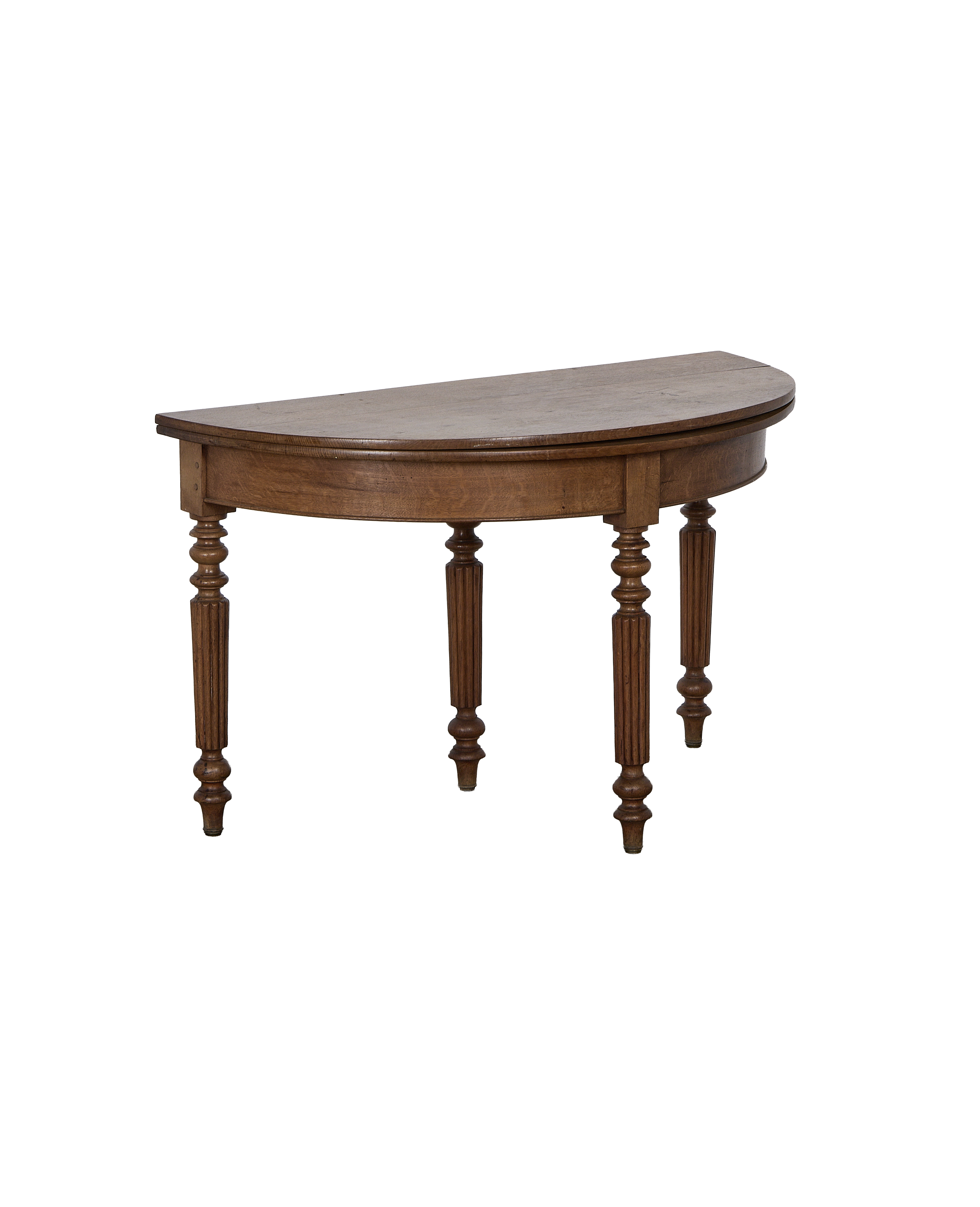 Vintage oak demi circle table from France, showing ornate turned and fluted legs.