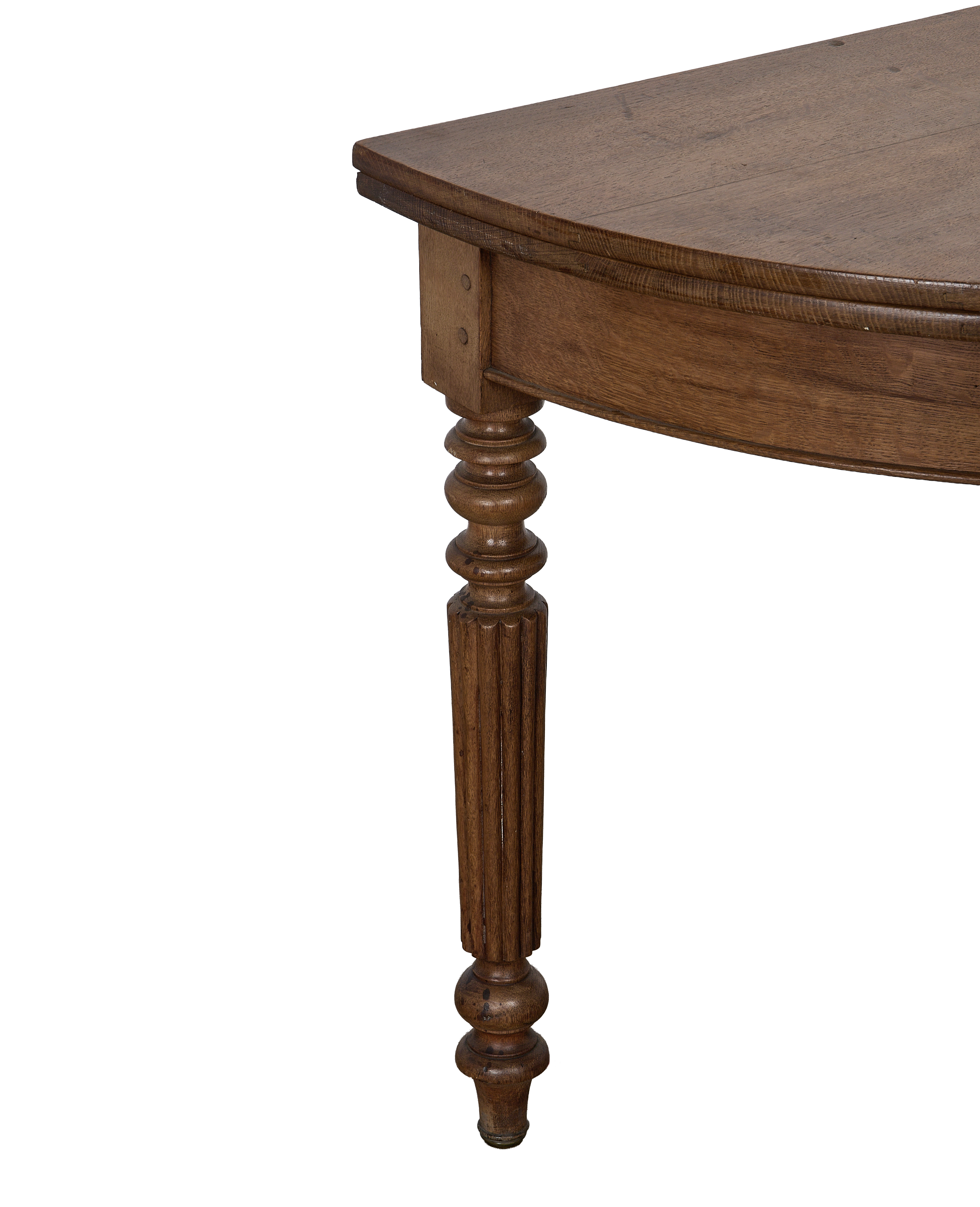 Vintage French oak demi-lune folding table leg with ornate fluted carving.
