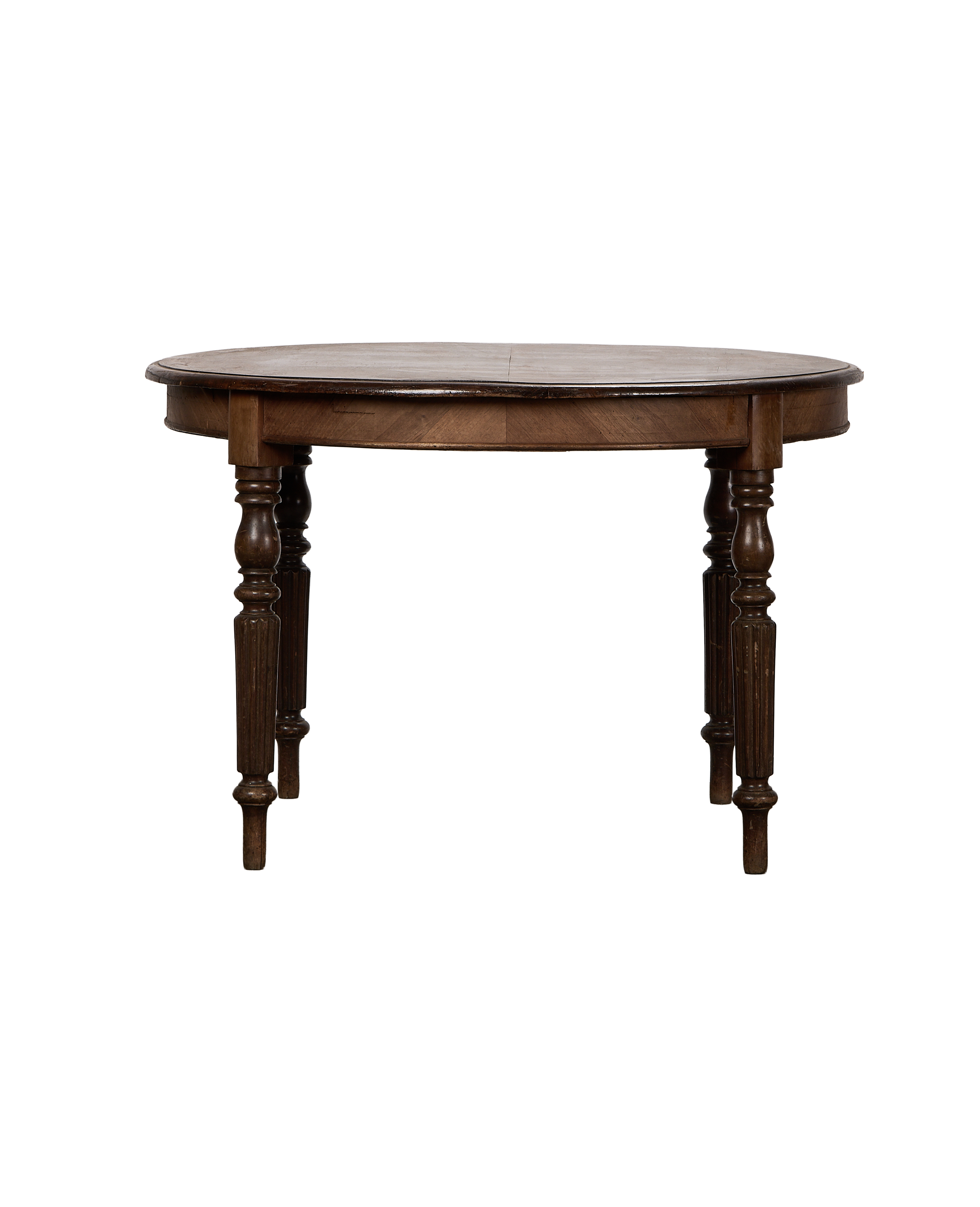 Vintage French oak round dining table with beautifully turned and reeded legs.