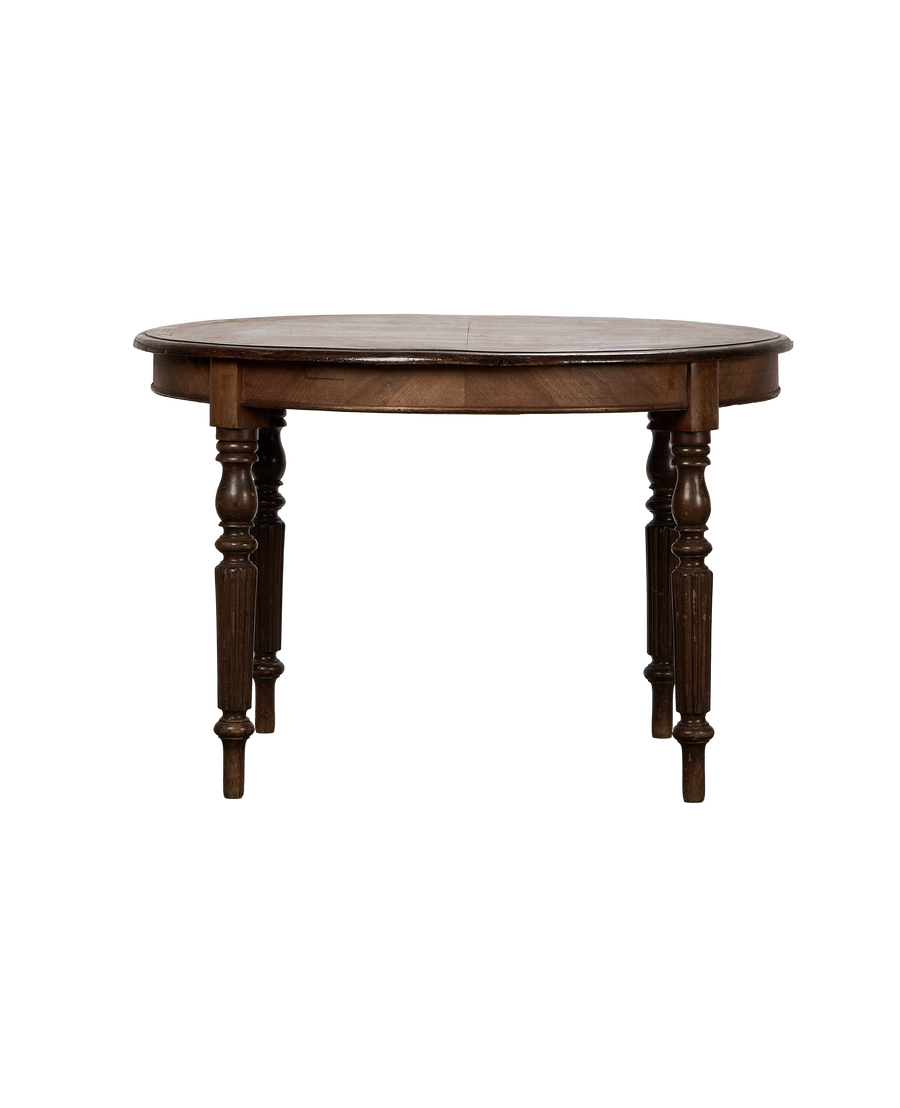 Vintage French oak round dining table with beautifully turned and reeded legs.
