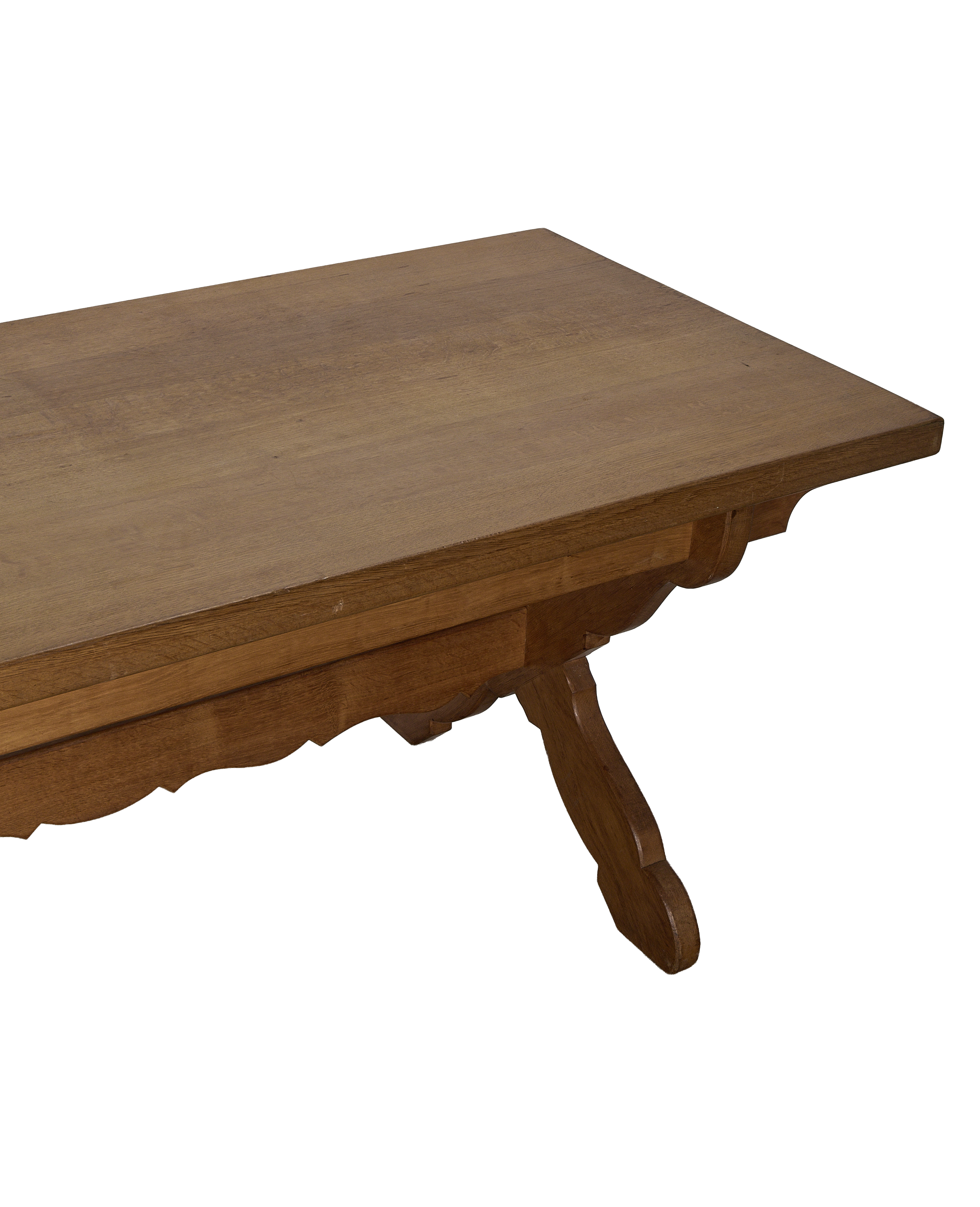 Vintage French oak Drapers dining table, close-up of decorative scalloped apron.