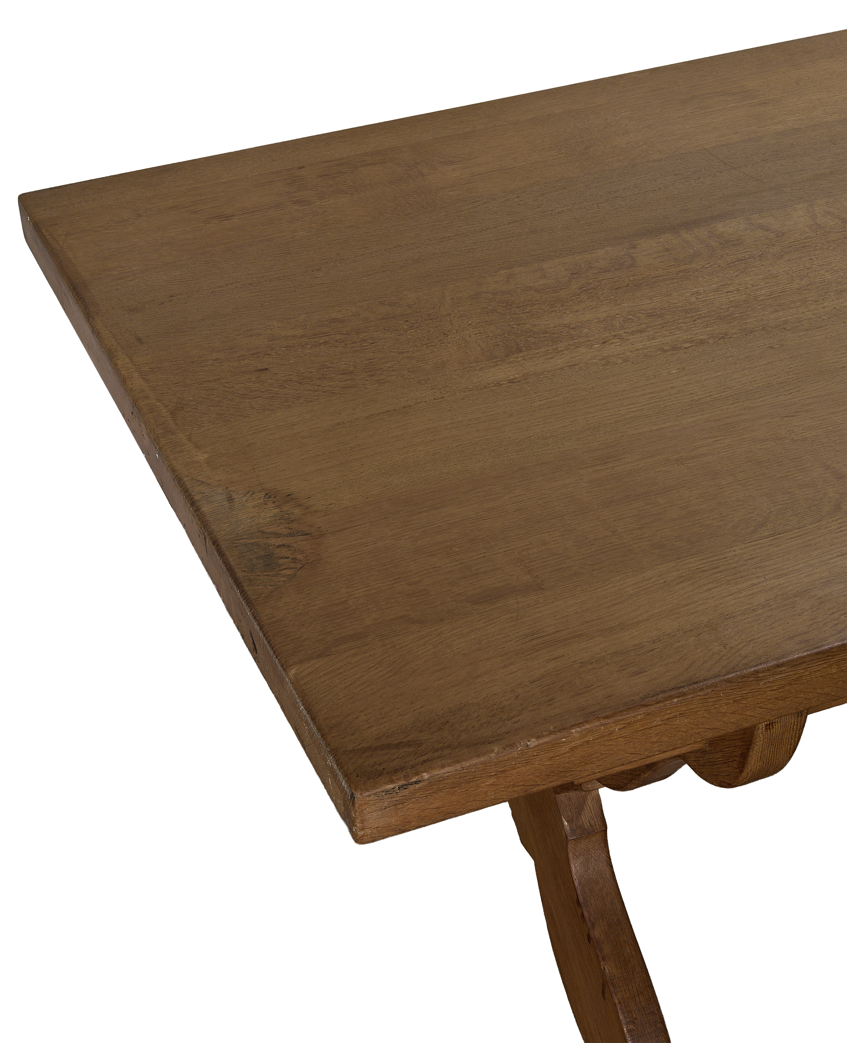 Close-up of vintage French oak Drapers dining table's distressed tabletop surface.