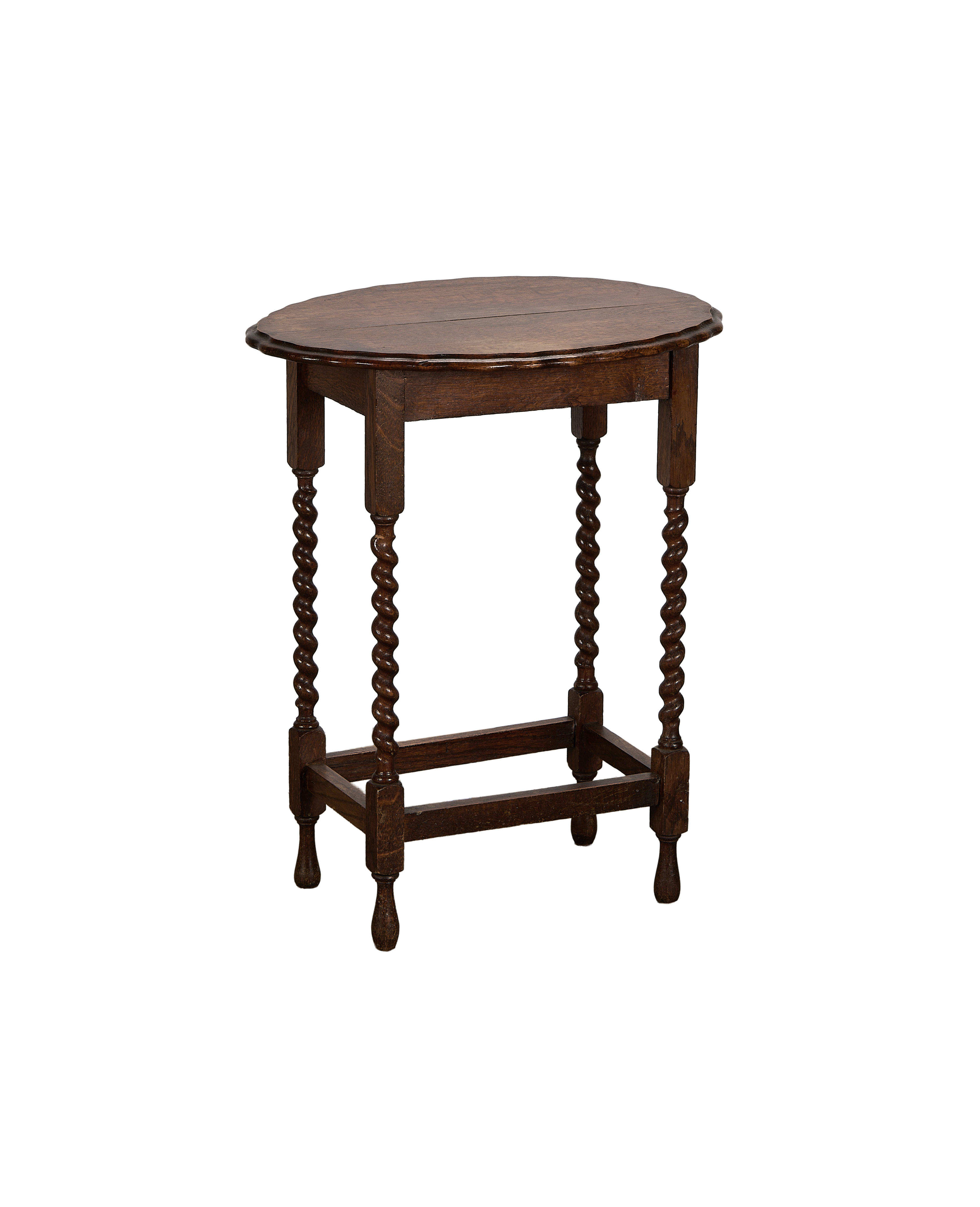 Vintage French oak barley twist table, showing carved stretcher base and round top.