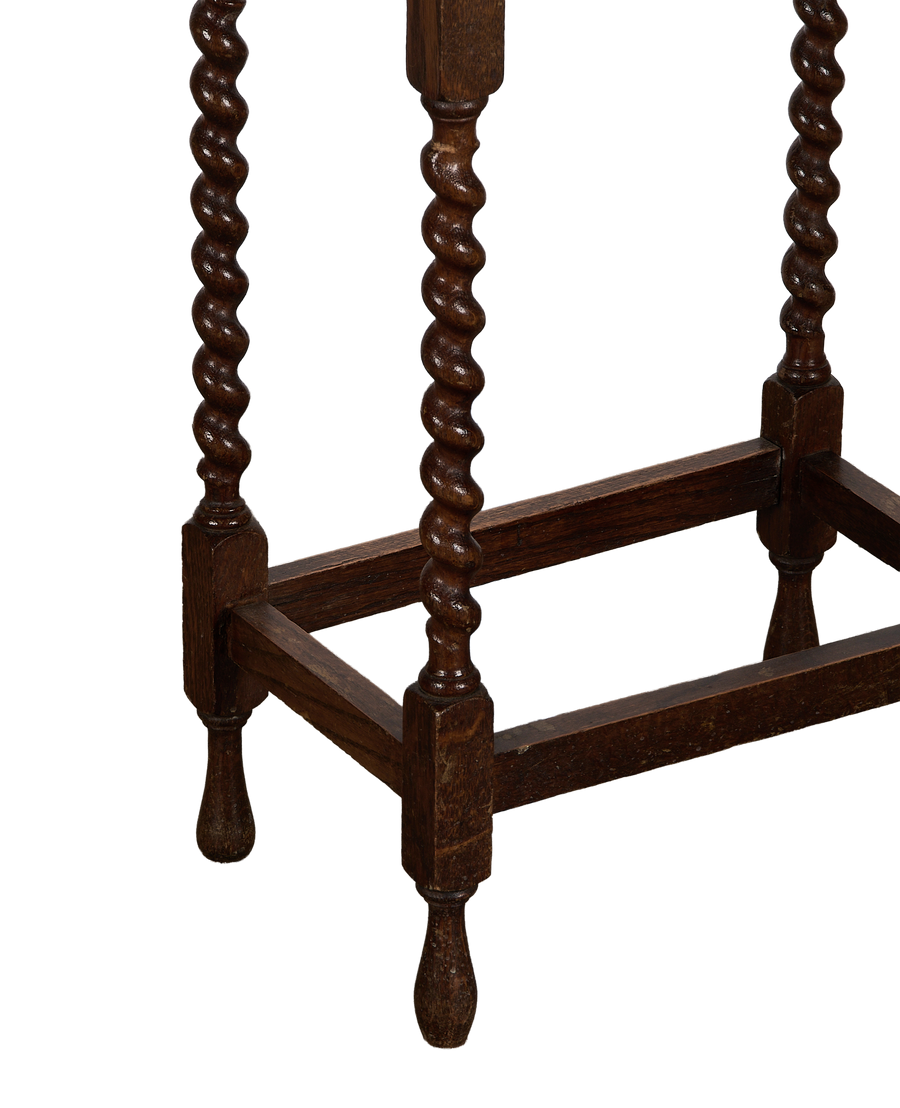 Vintage French oak Barley Twist table base detail, showing ornate, dark brown legs and stretchers with natural patina.