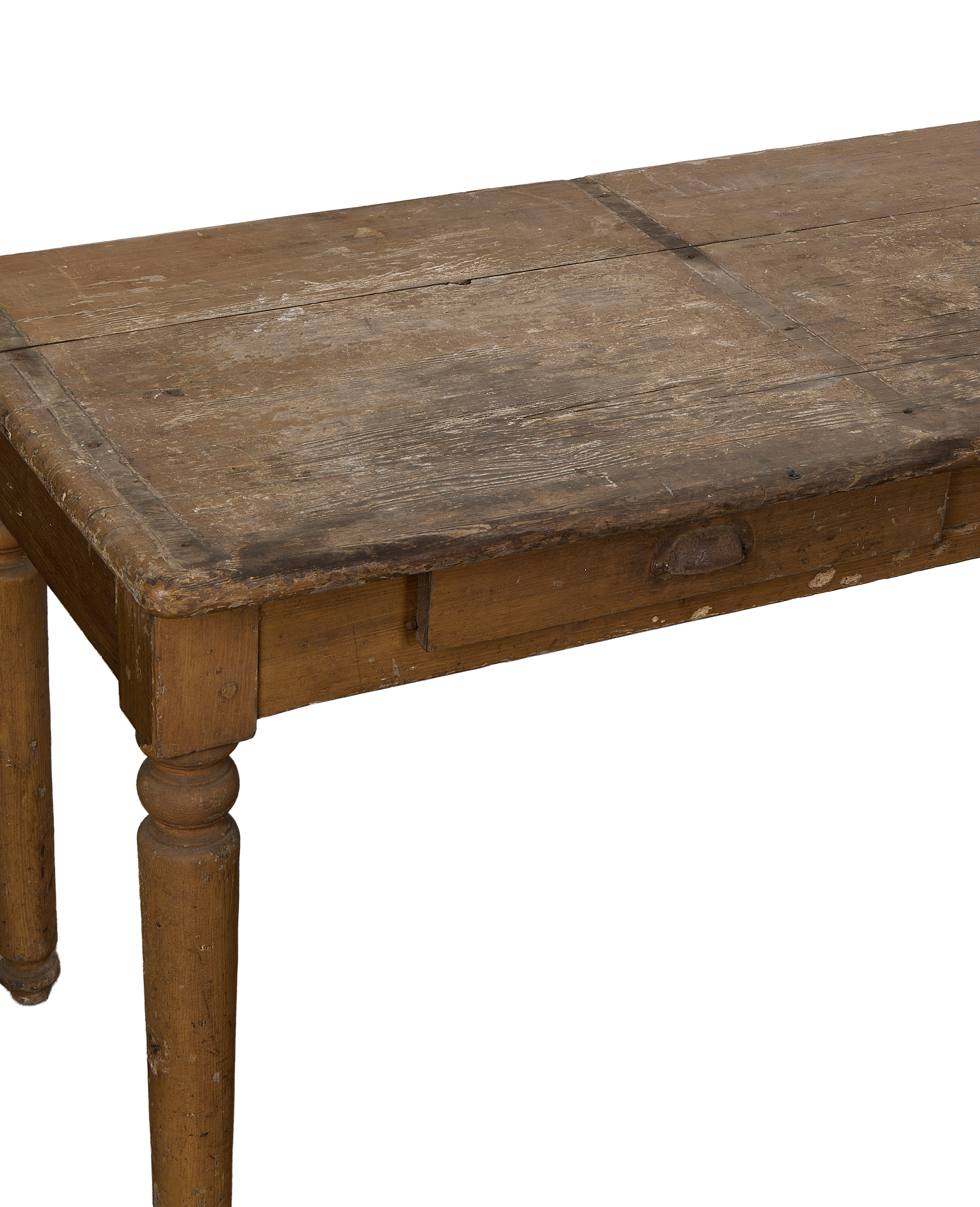 Vintage distressed oak monastery table with an ornate carved leg and rough patina.