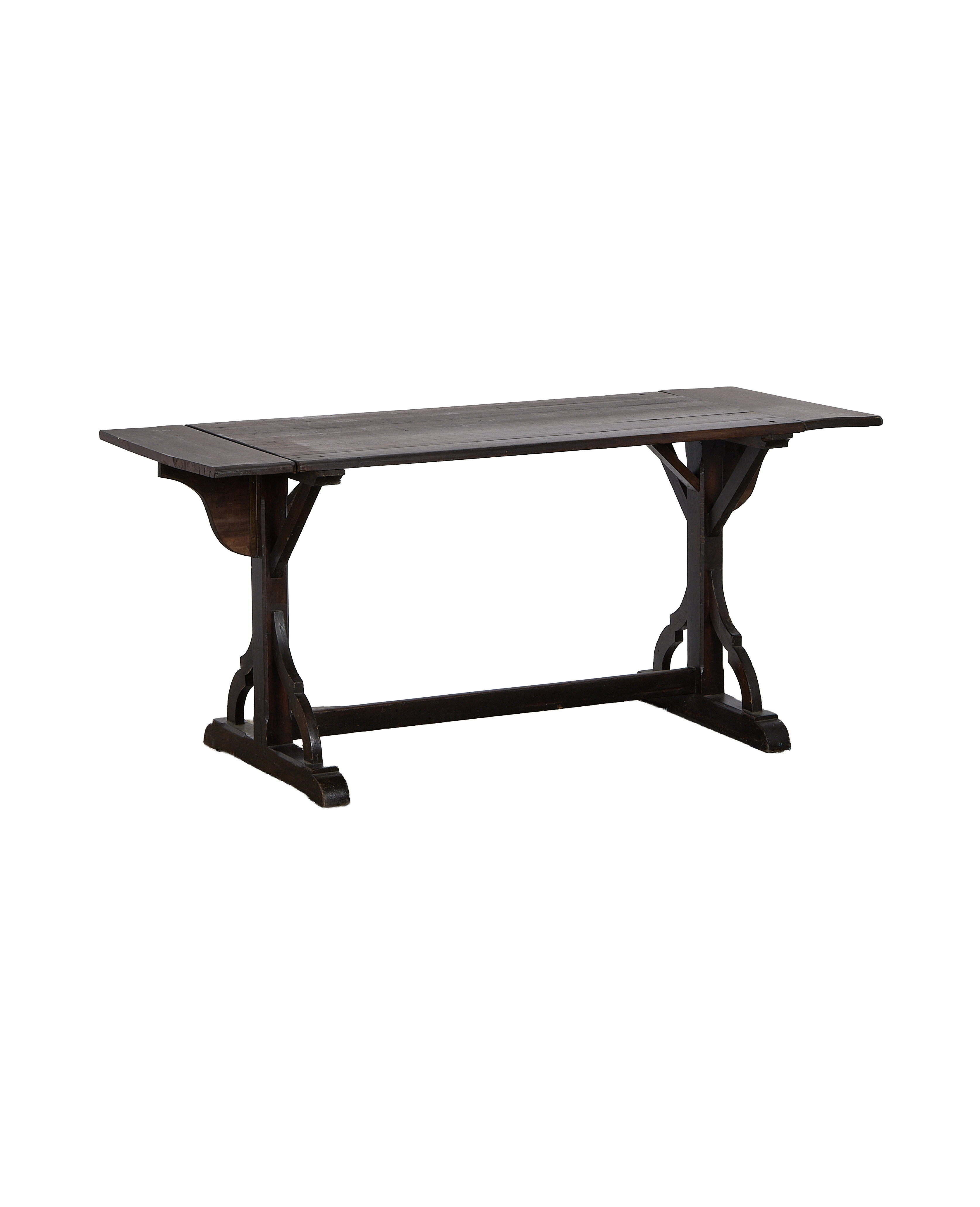 Vintage French oak drop leaf table, dark distressed wood, extended leaves, ornate trestle base.