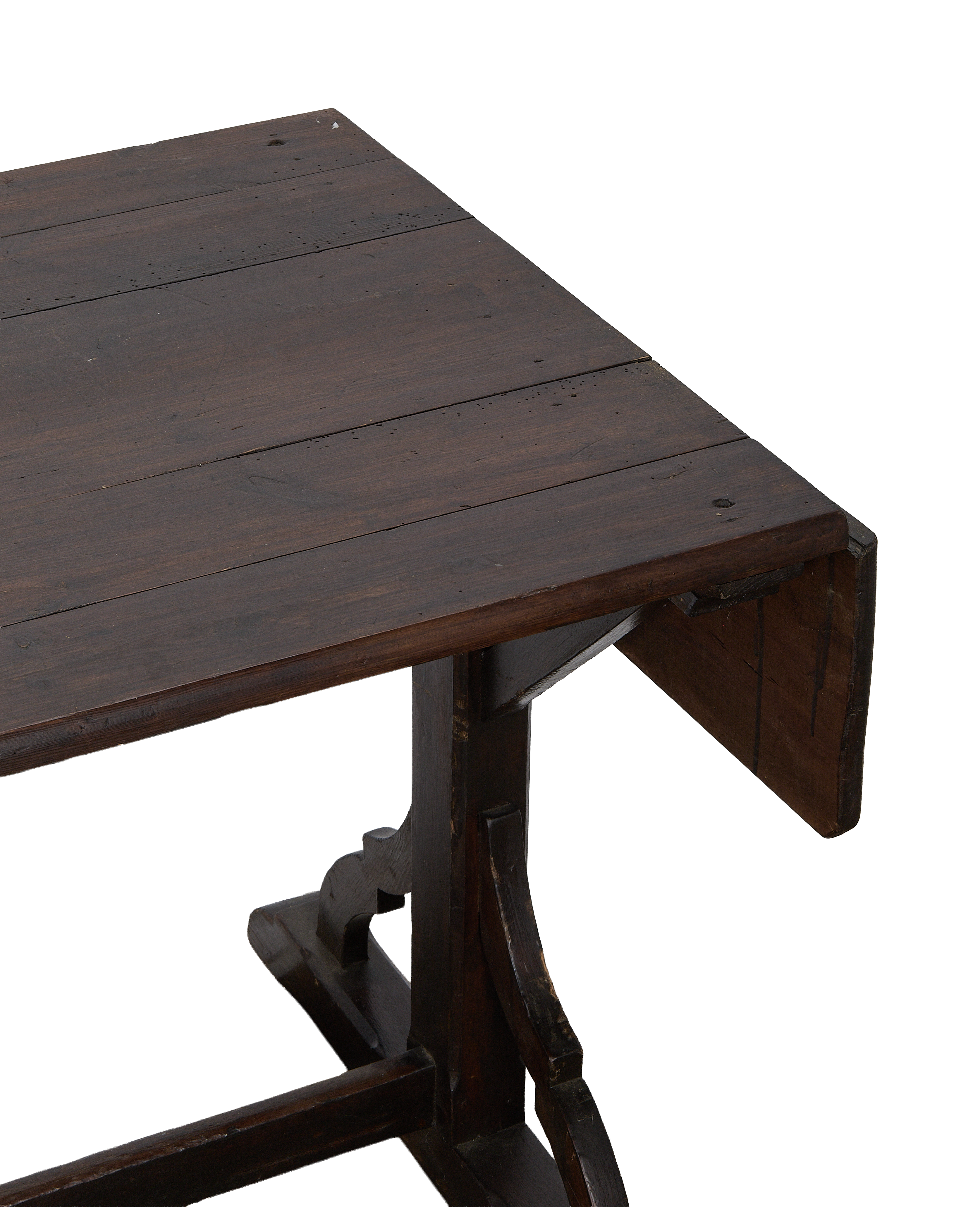 Right corner of vintage French oak drop-leaf table, showing detailed construction.