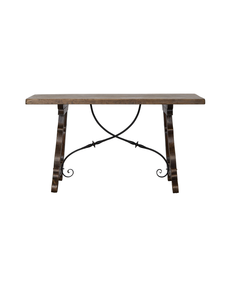 Vintage French oak refectory table's wrought iron stretcher detail, showing crossed bar.