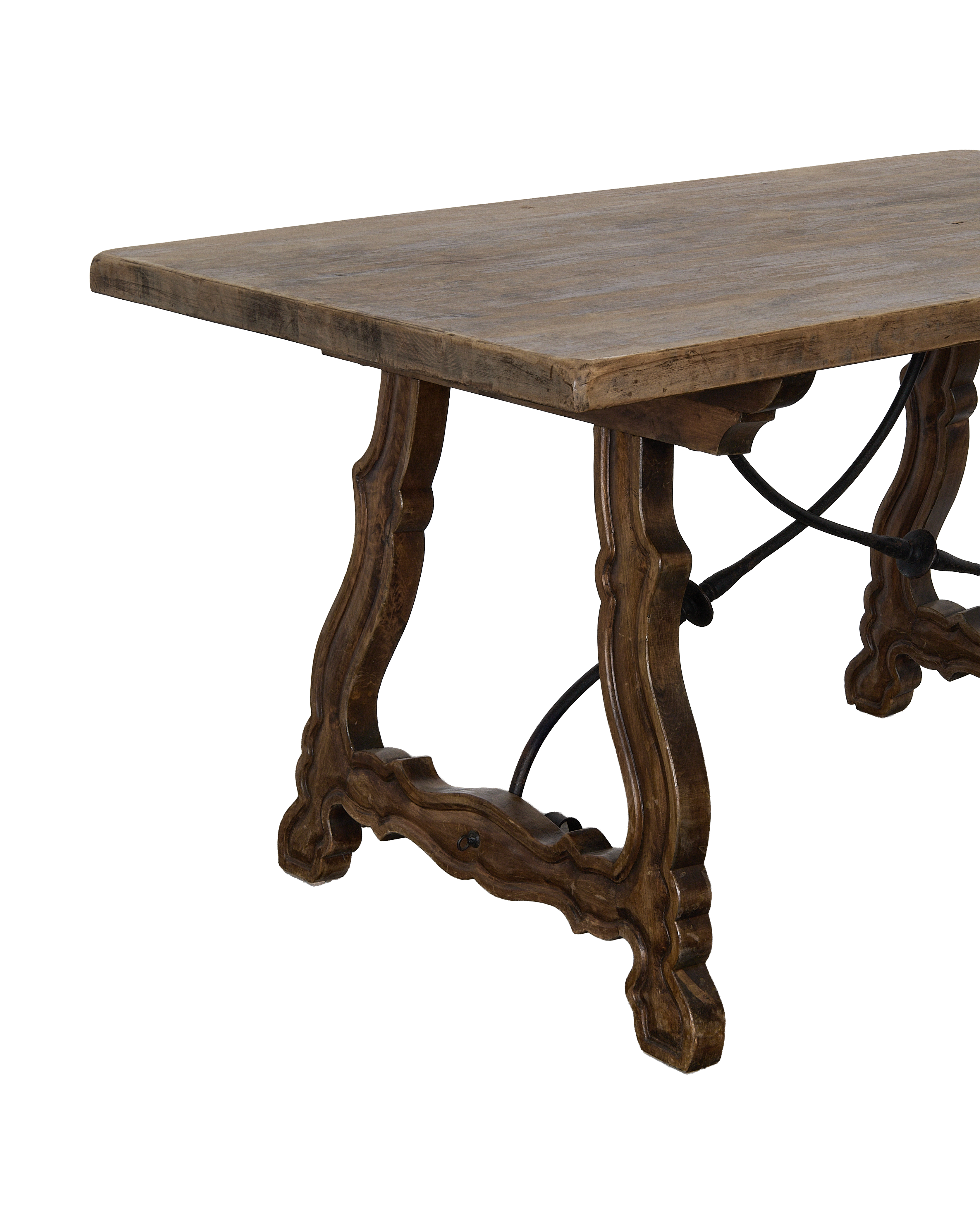 Vintage French oak refectory table, showing distressed tabletop and ornate carved legs.