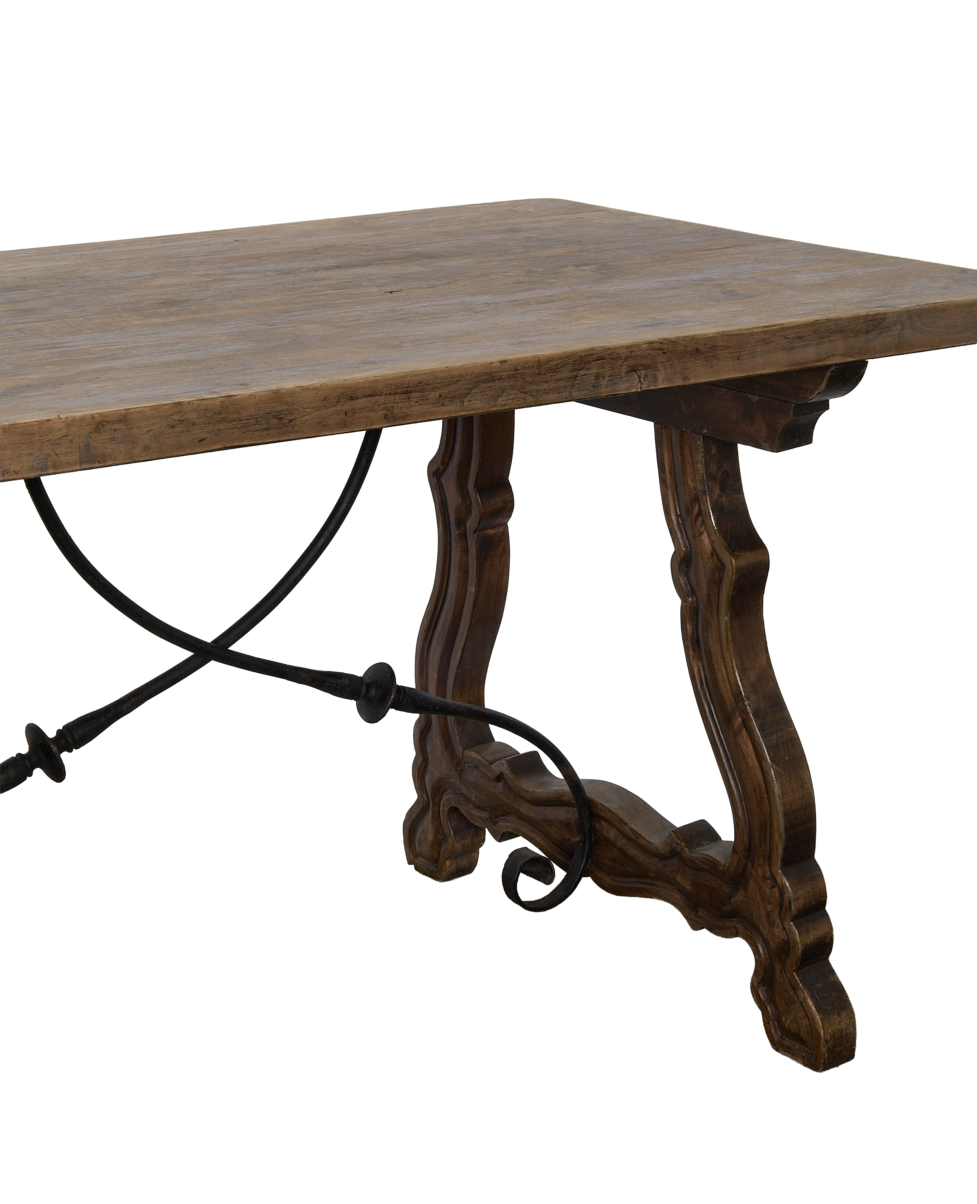 Vintage French oak refectory table, showing ornate carved legs and stretcher detail.